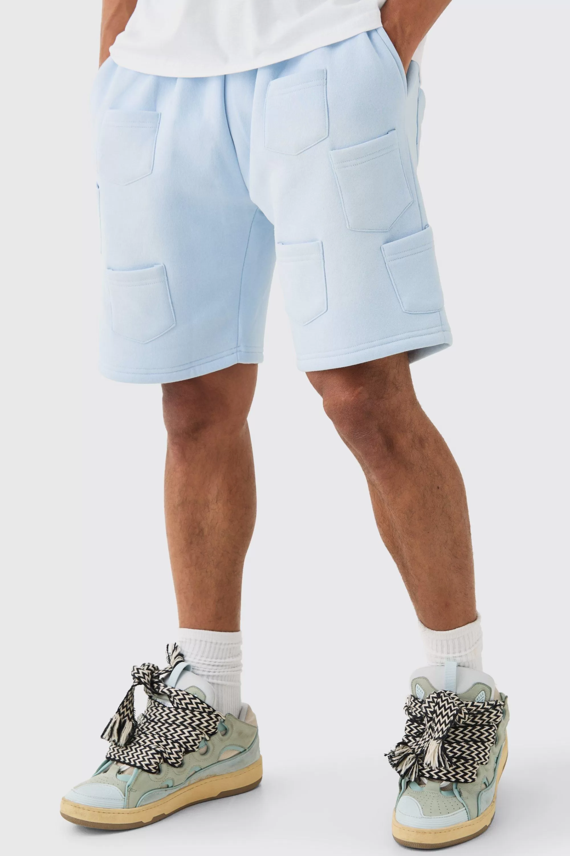 boohooMAN Relaxed All Over Pocket Spray Wash Shorts | UK