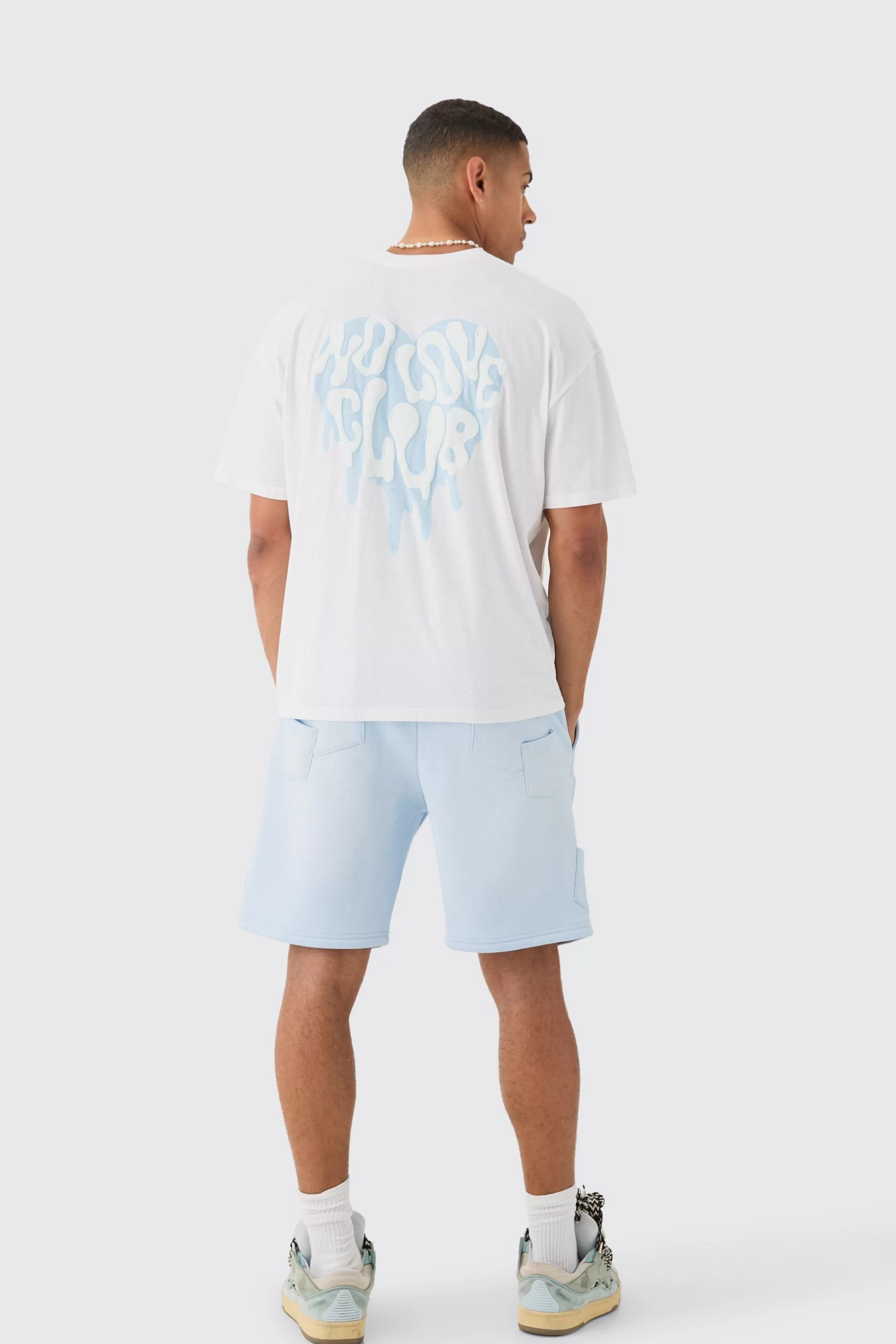 boohooMAN Relaxed All Over Pocket Spray Wash Shorts | UK