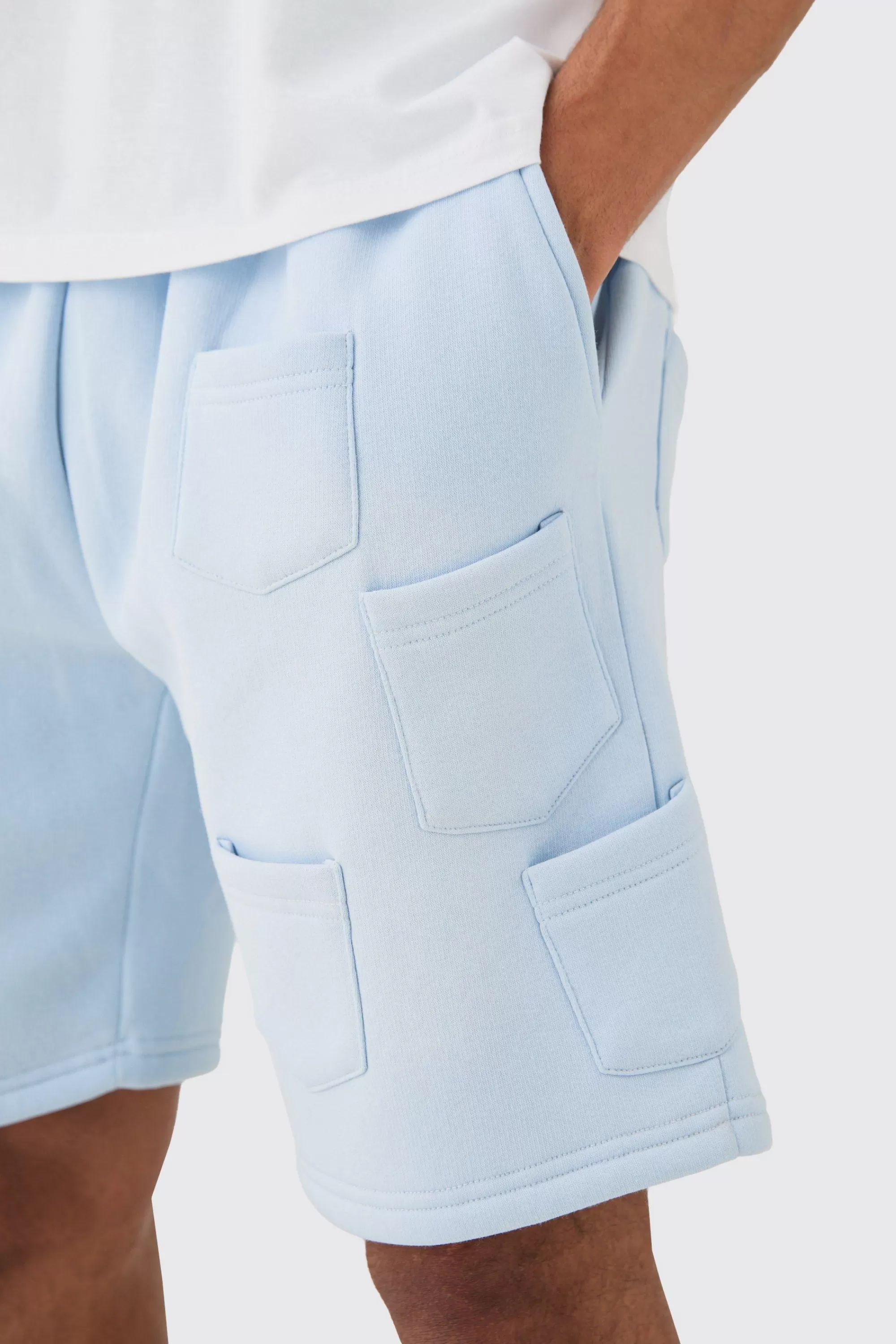 boohooMAN Relaxed All Over Pocket Spray Wash Shorts | UK