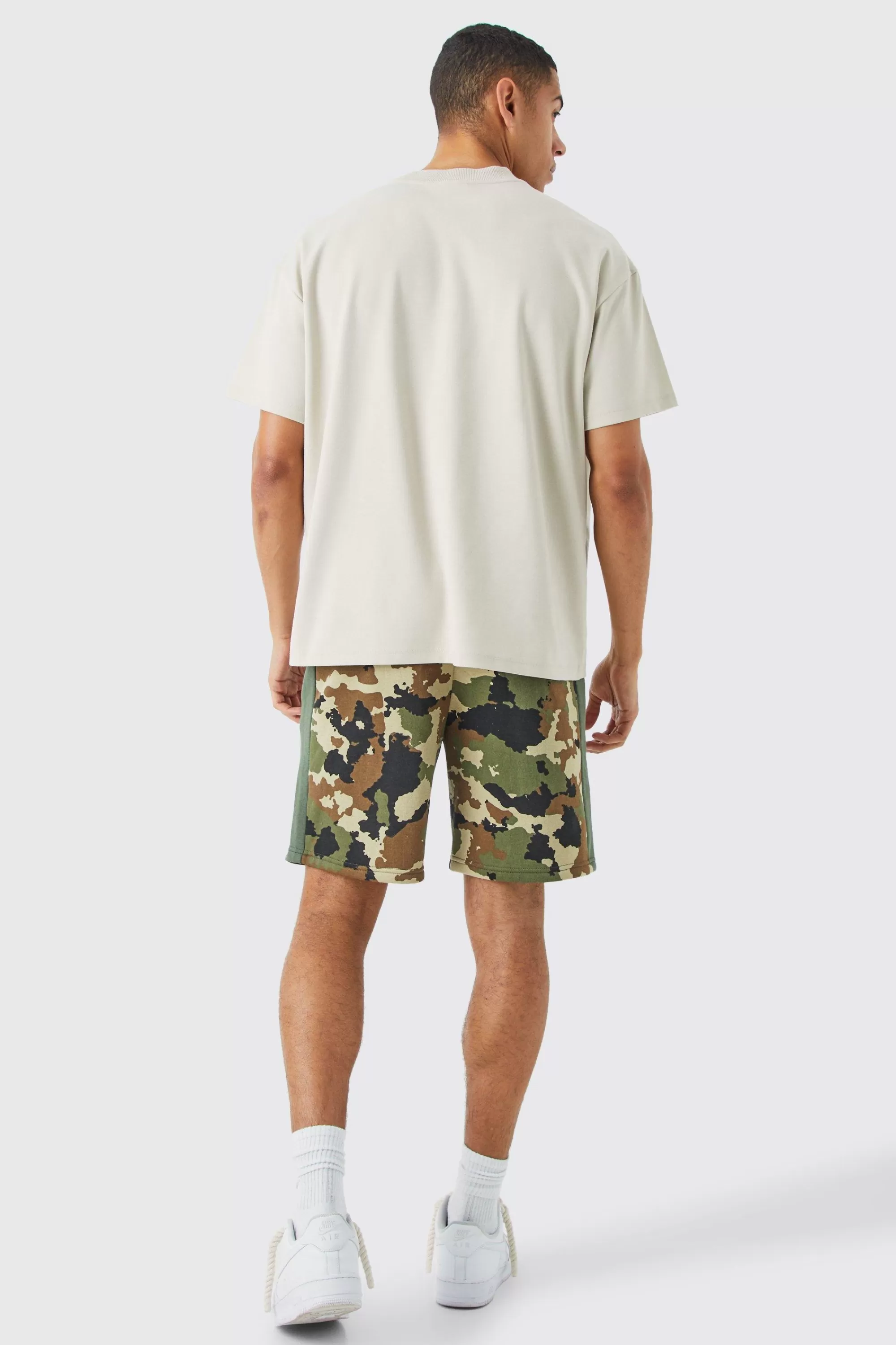 boohooMAN Relaxed Camo Side Panel Shorts | UK