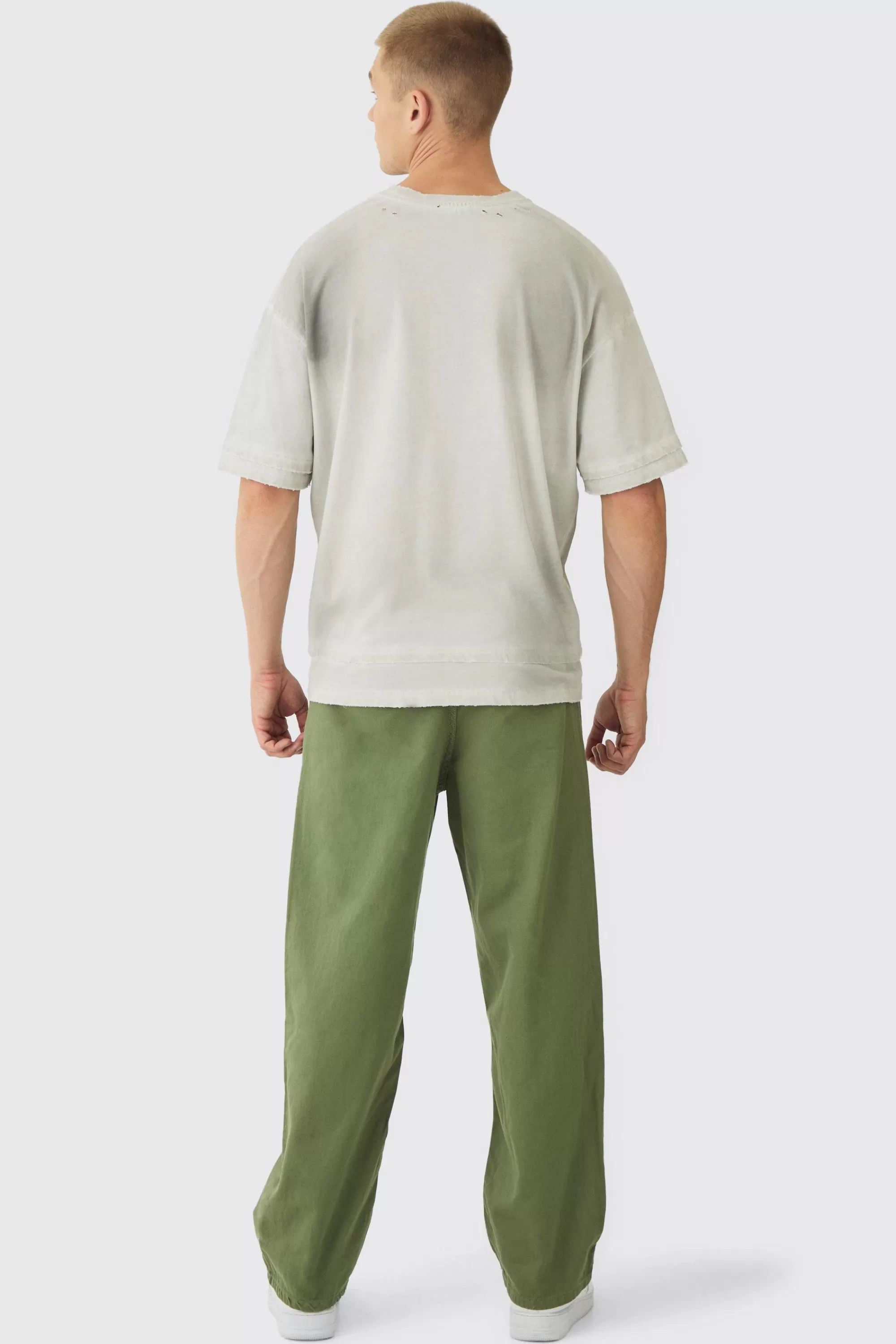 boohooMAN Relaxed Chinos With Drawcords In | UK