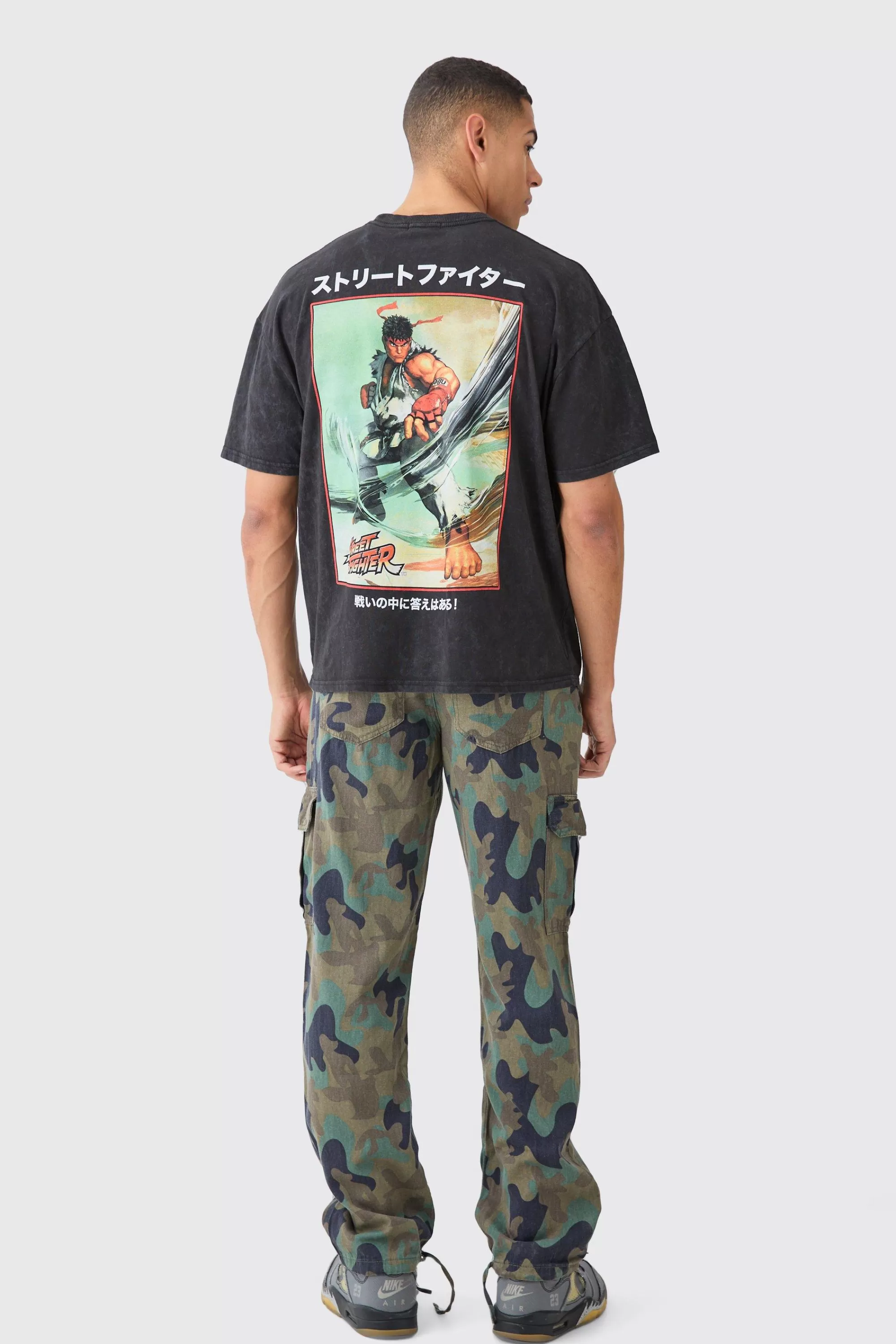 boohooMAN Relaxed Crotch Print Tie Hem Camo Cargo Trouser | UK