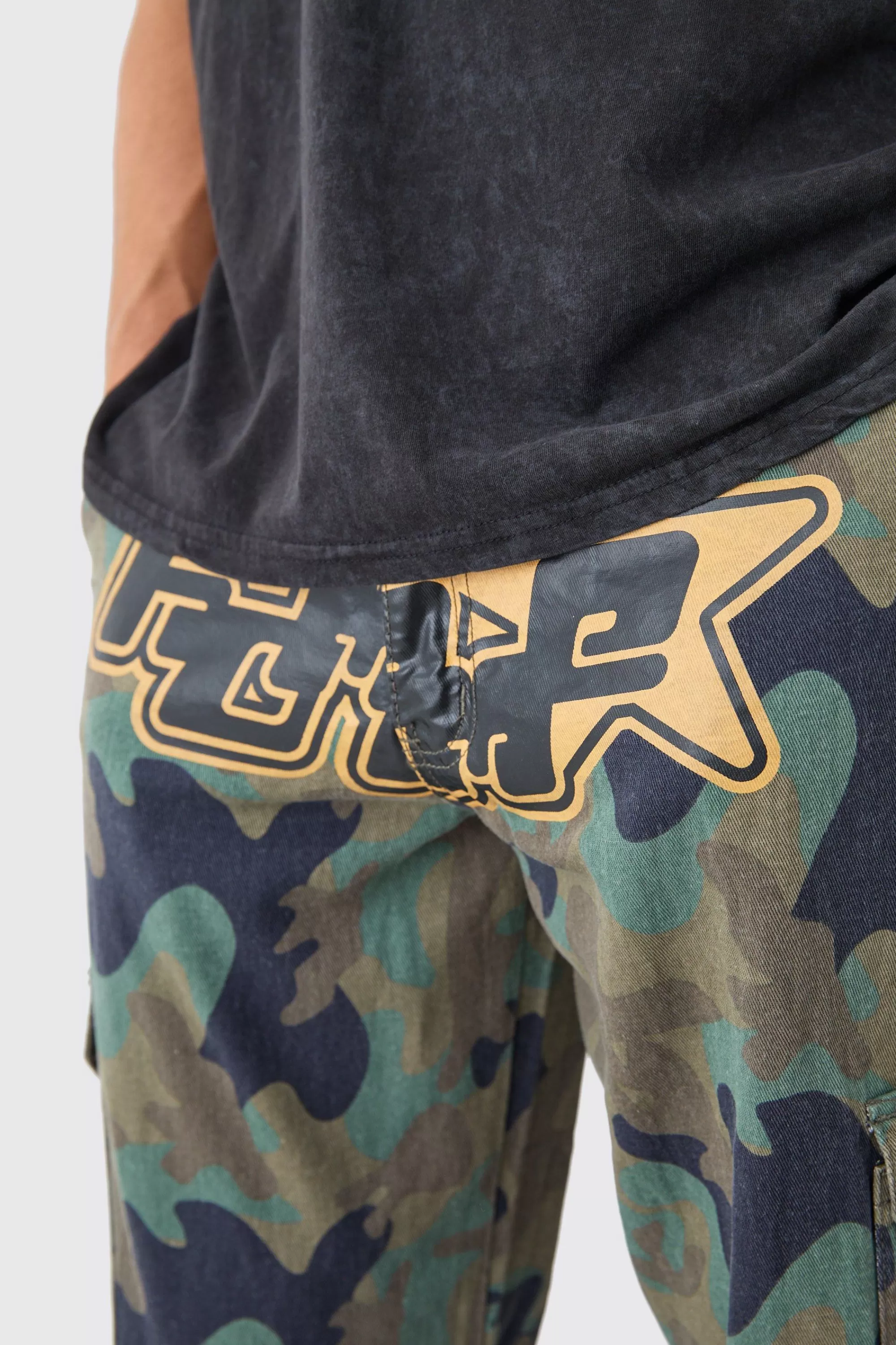 boohooMAN Relaxed Crotch Print Tie Hem Camo Cargo Trouser | UK