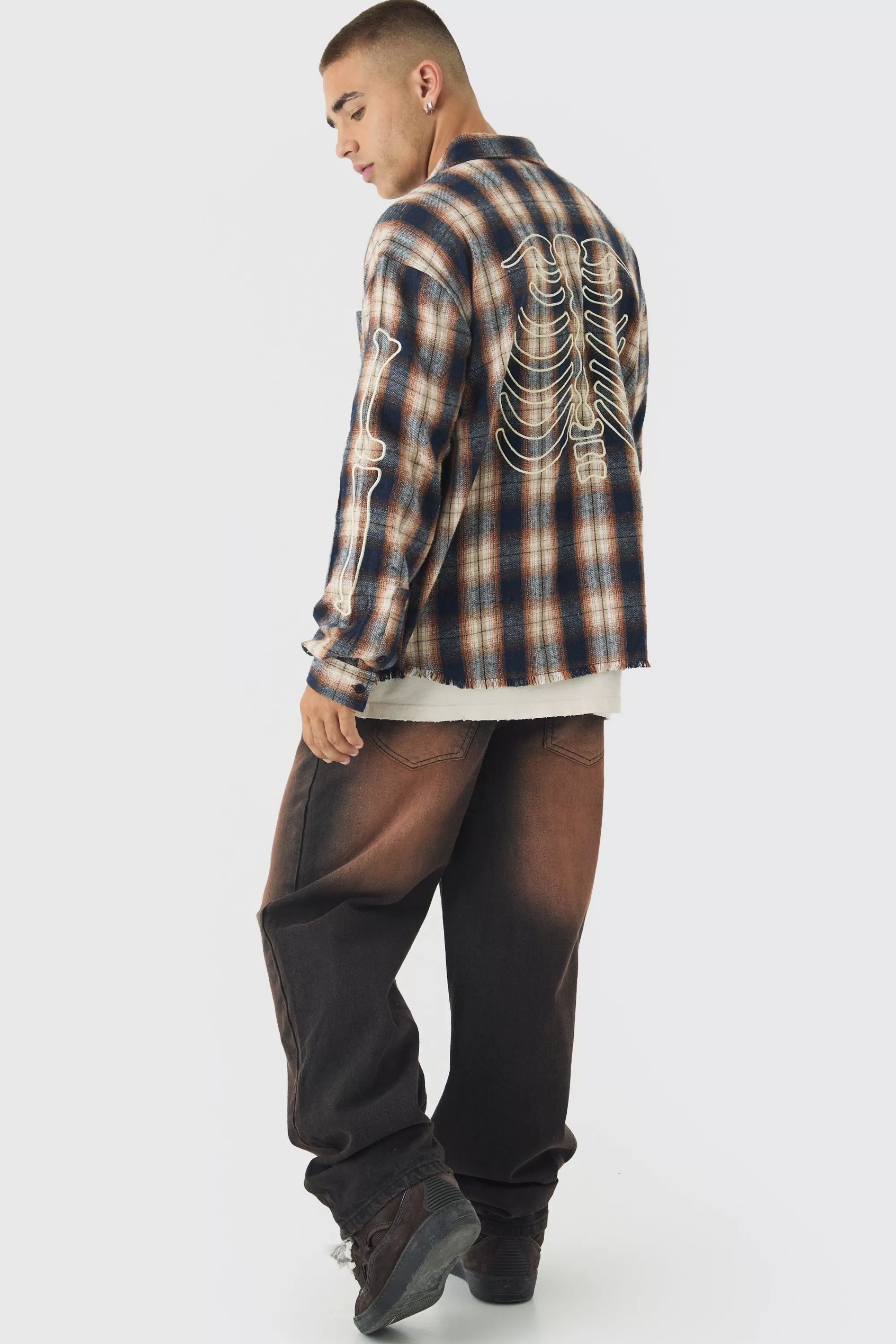 boohooMAN Relaxed Distressed Nibbled Jeans | UK
