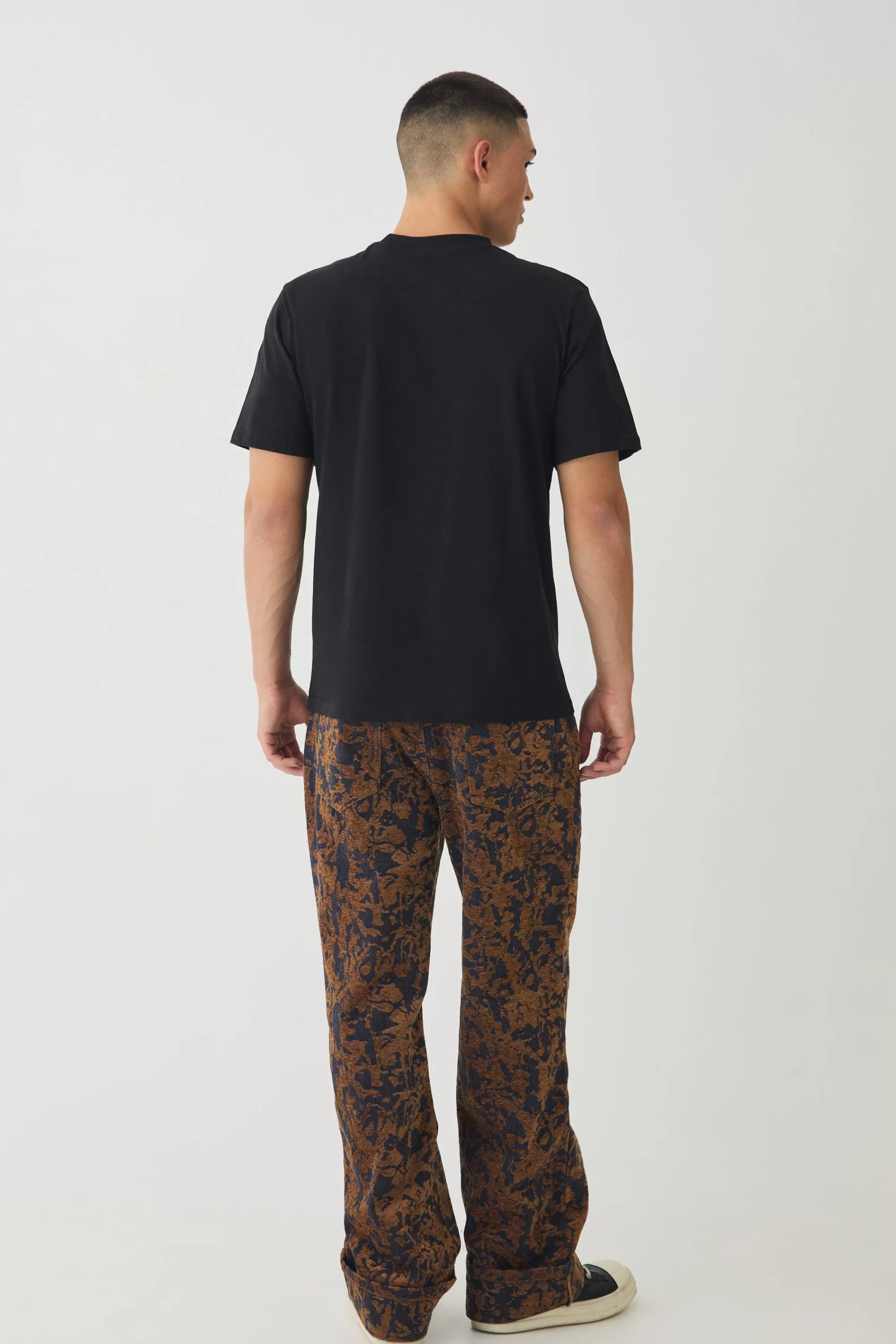 boohooMAN Relaxed Fit Abstract Flock Turn Up Hem Jeans | UK