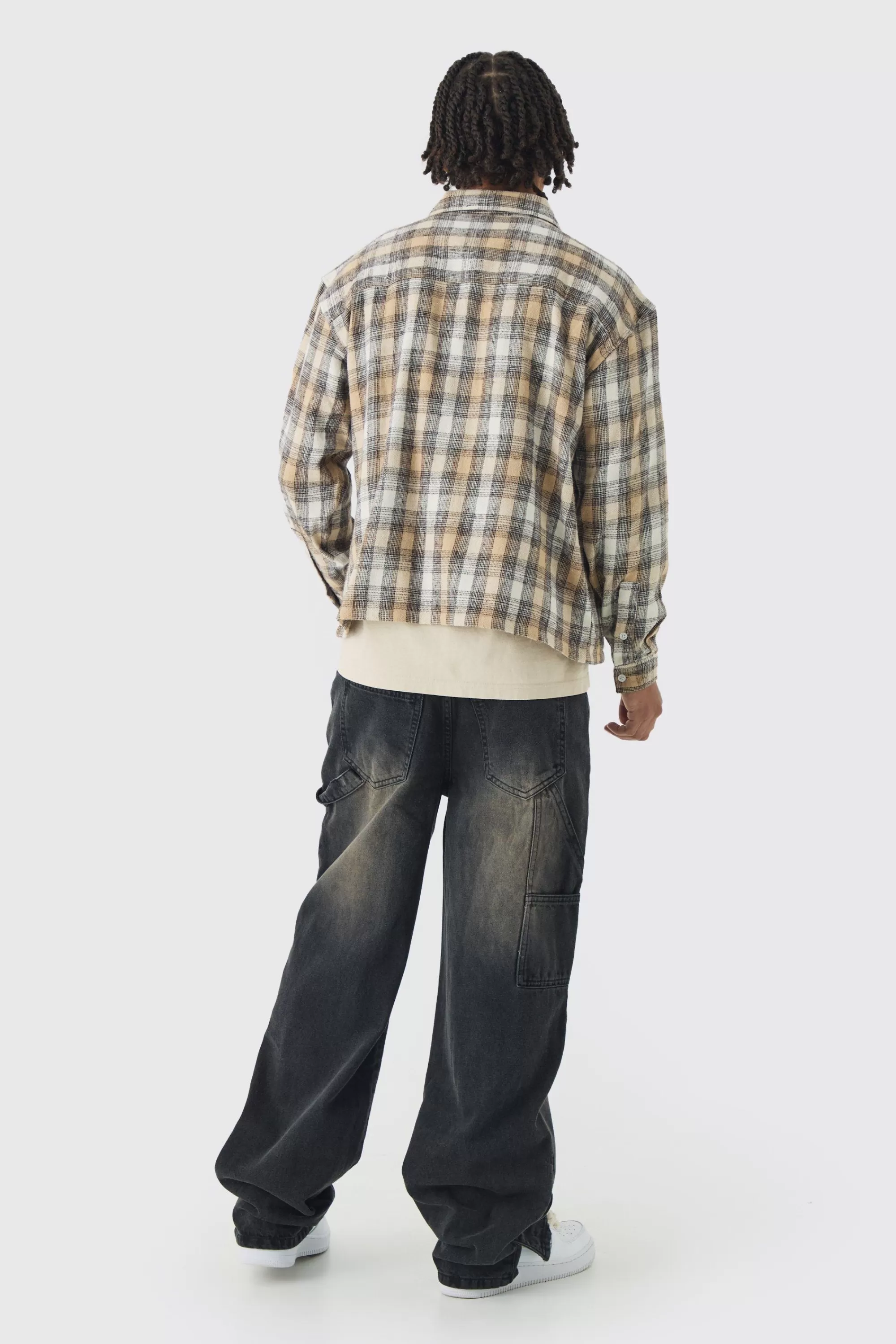 boohooMAN Relaxed Fit Carpenter Jeans With Split Hem | UK