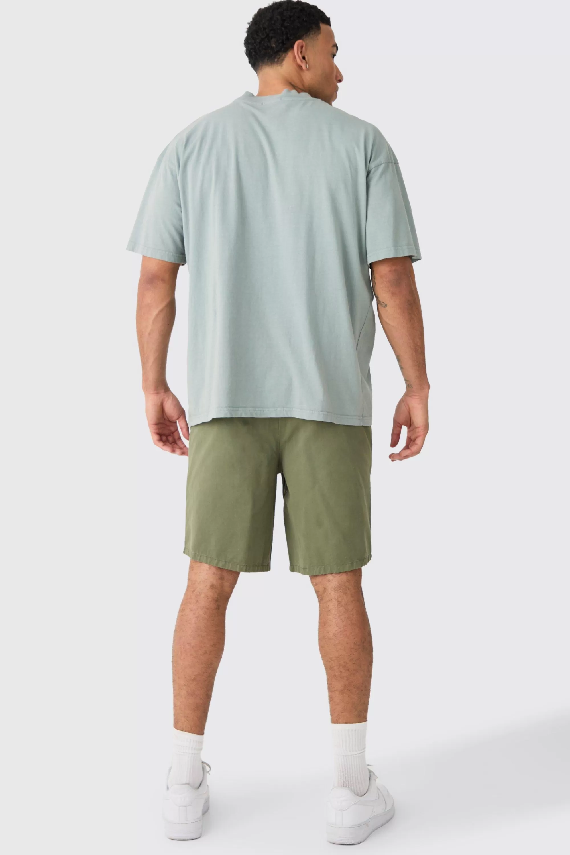 boohooMAN Relaxed Fit Elasticated Waist Chino Shorts In | UK