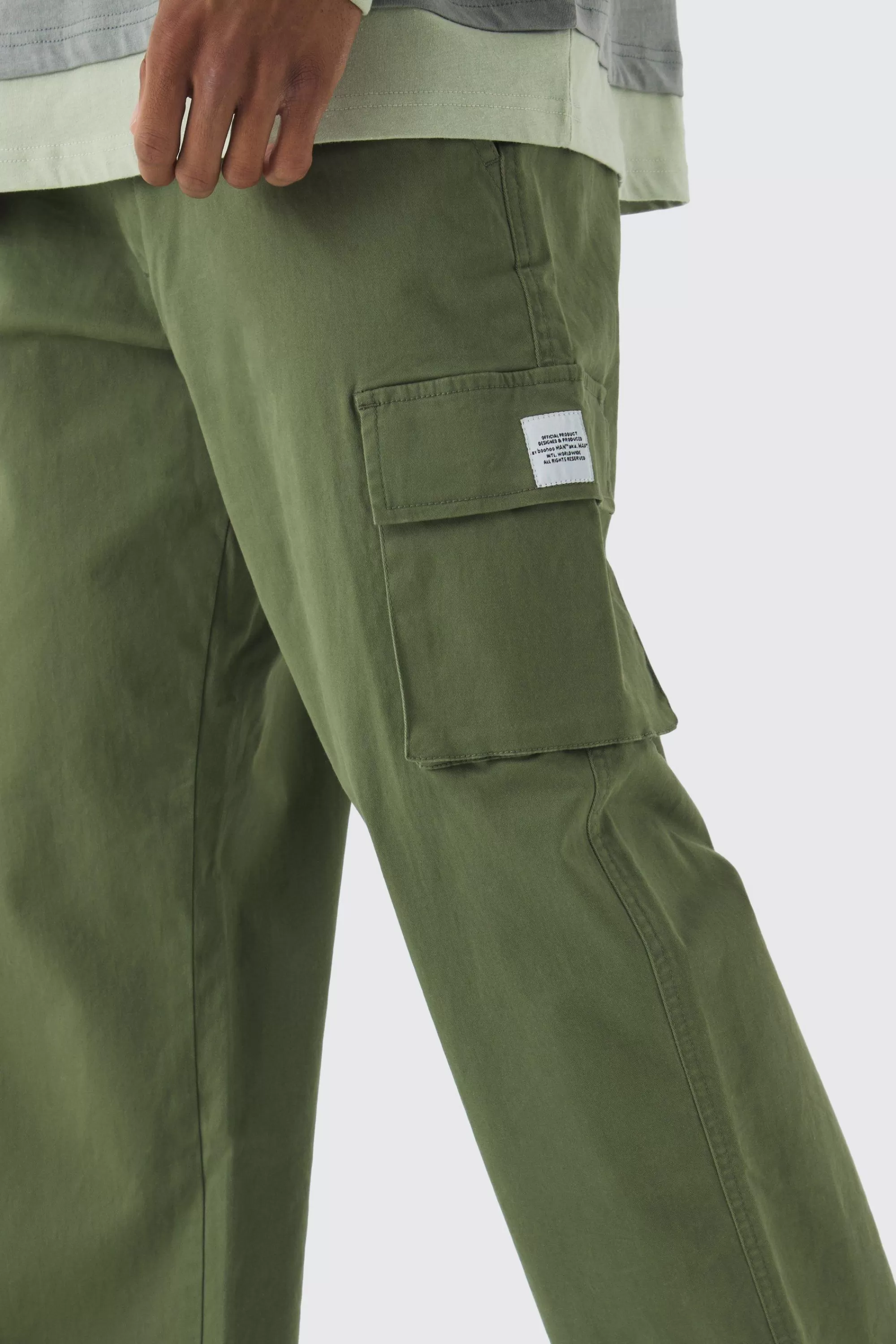 boohooMAN Relaxed Fit Fixed Waist Woven Tab Cargo Trousers | UK