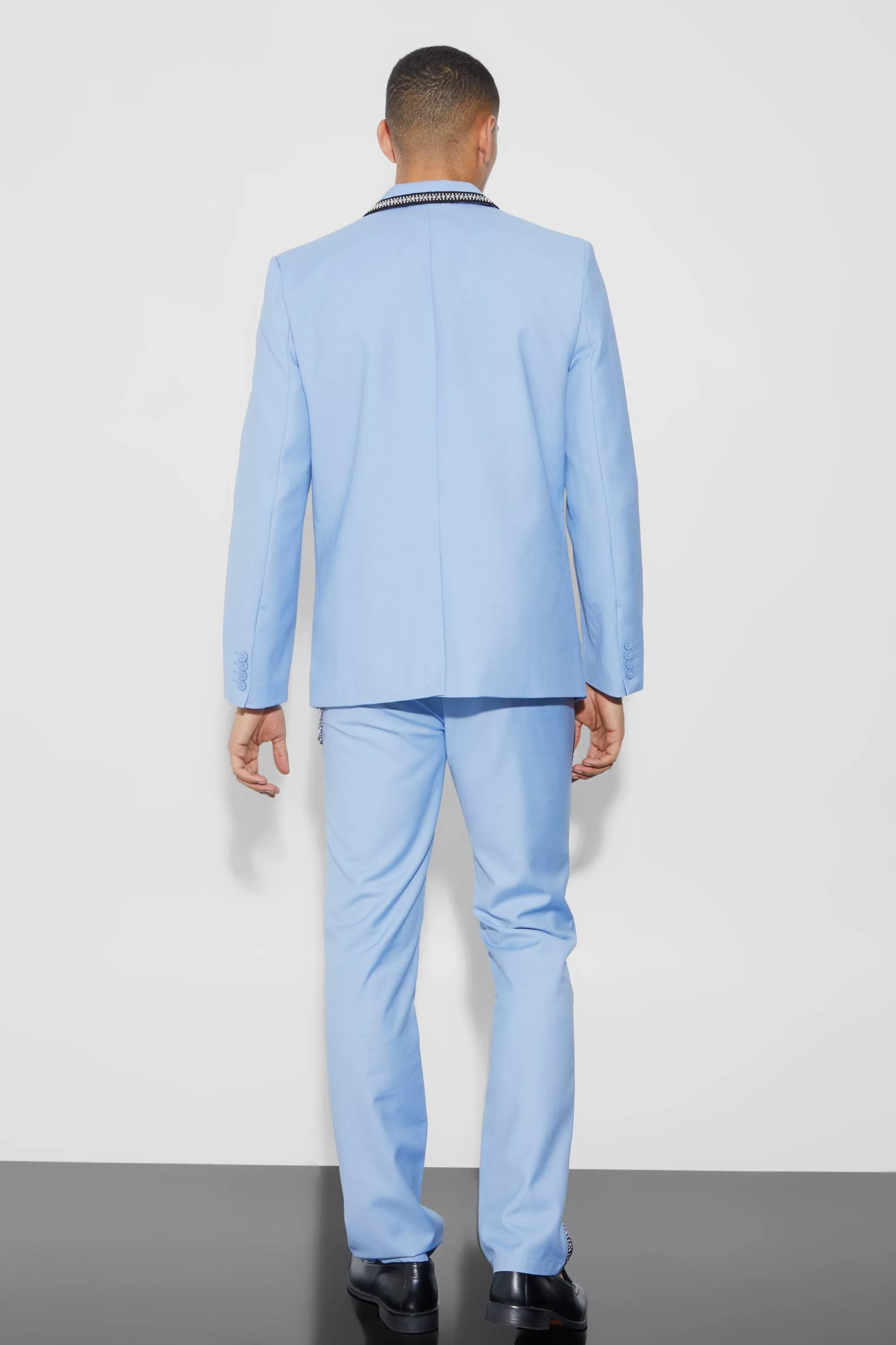 boohooMAN Relaxed Fit Stud Detail Trouser With Chain | UK
