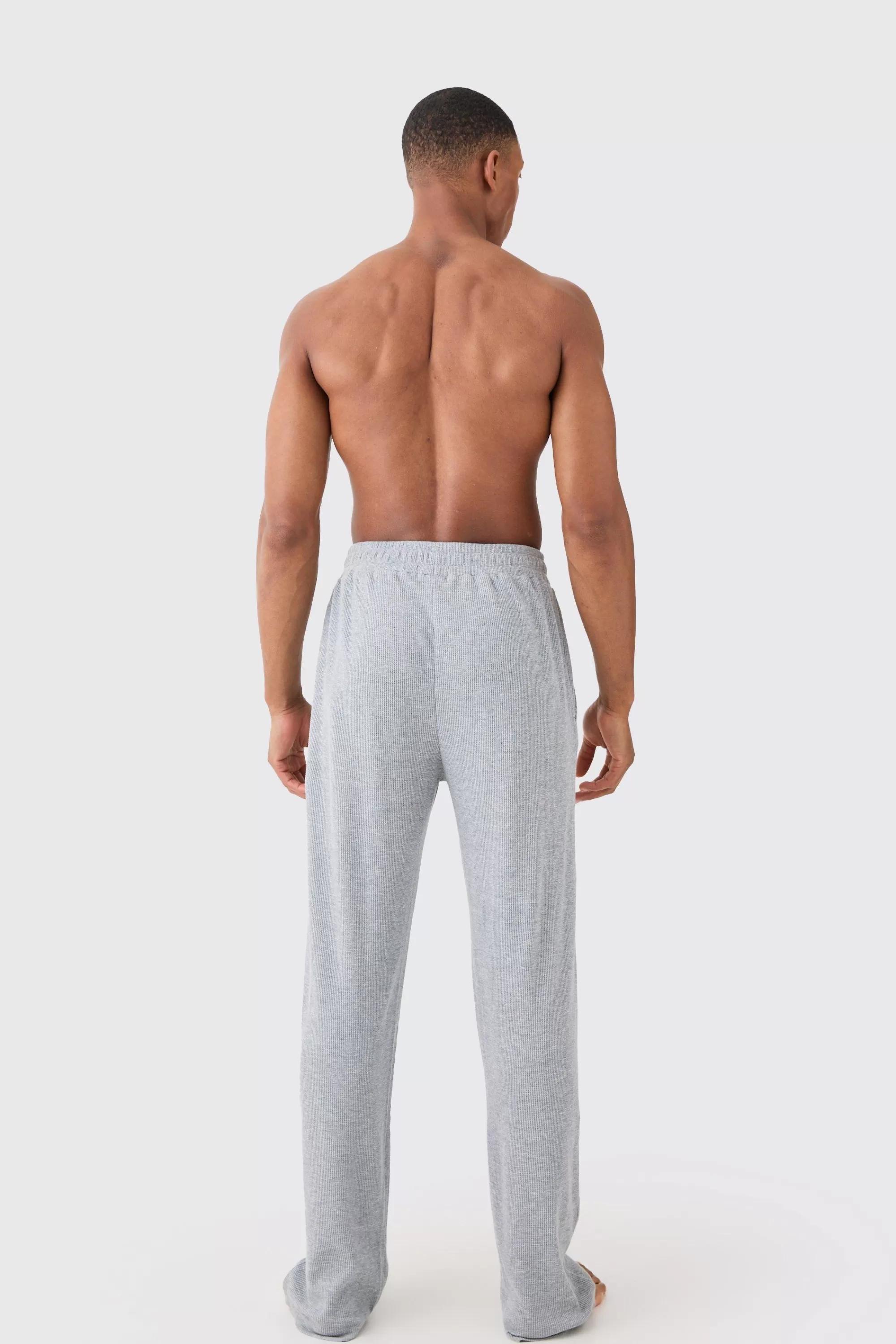 boohooMAN Relaxed Fit Waffle Lounge Bottoms In | UK
