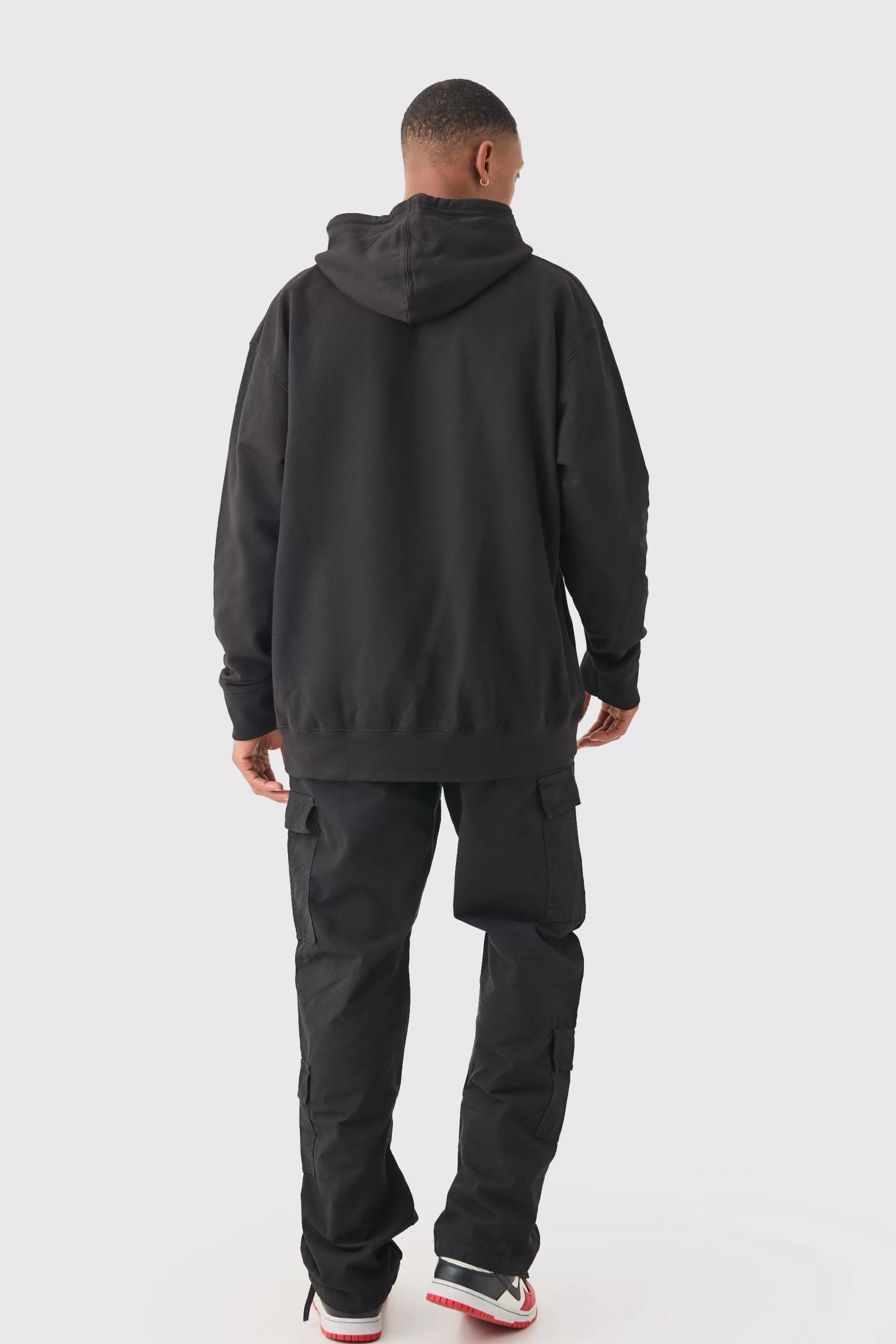 boohooMAN Relaxed Multi Cargo Ripstop Trouser With Woven Tab | UK