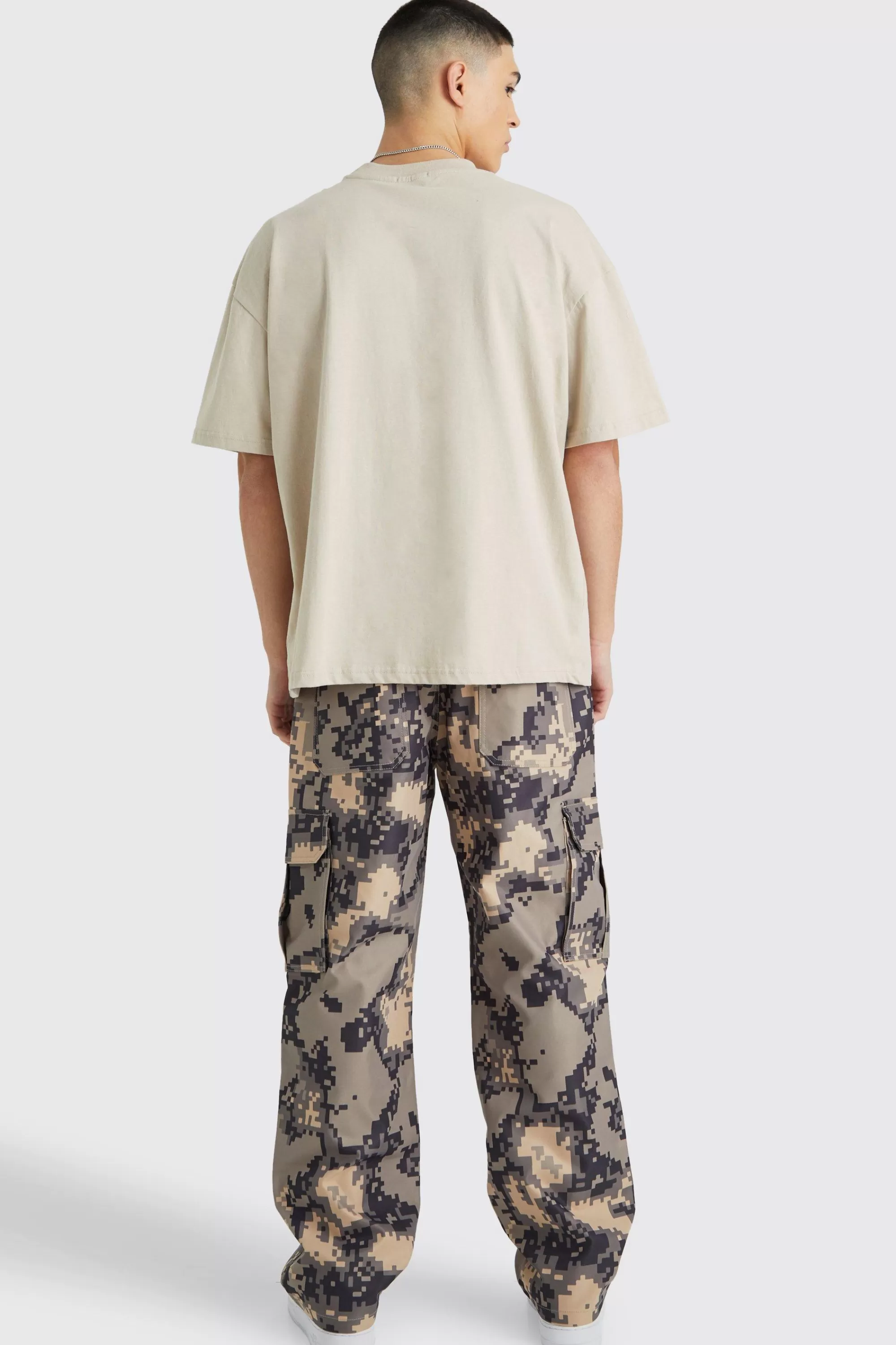 boohooMAN Relaxed Pixelated Camo Cargo Trouser | UK