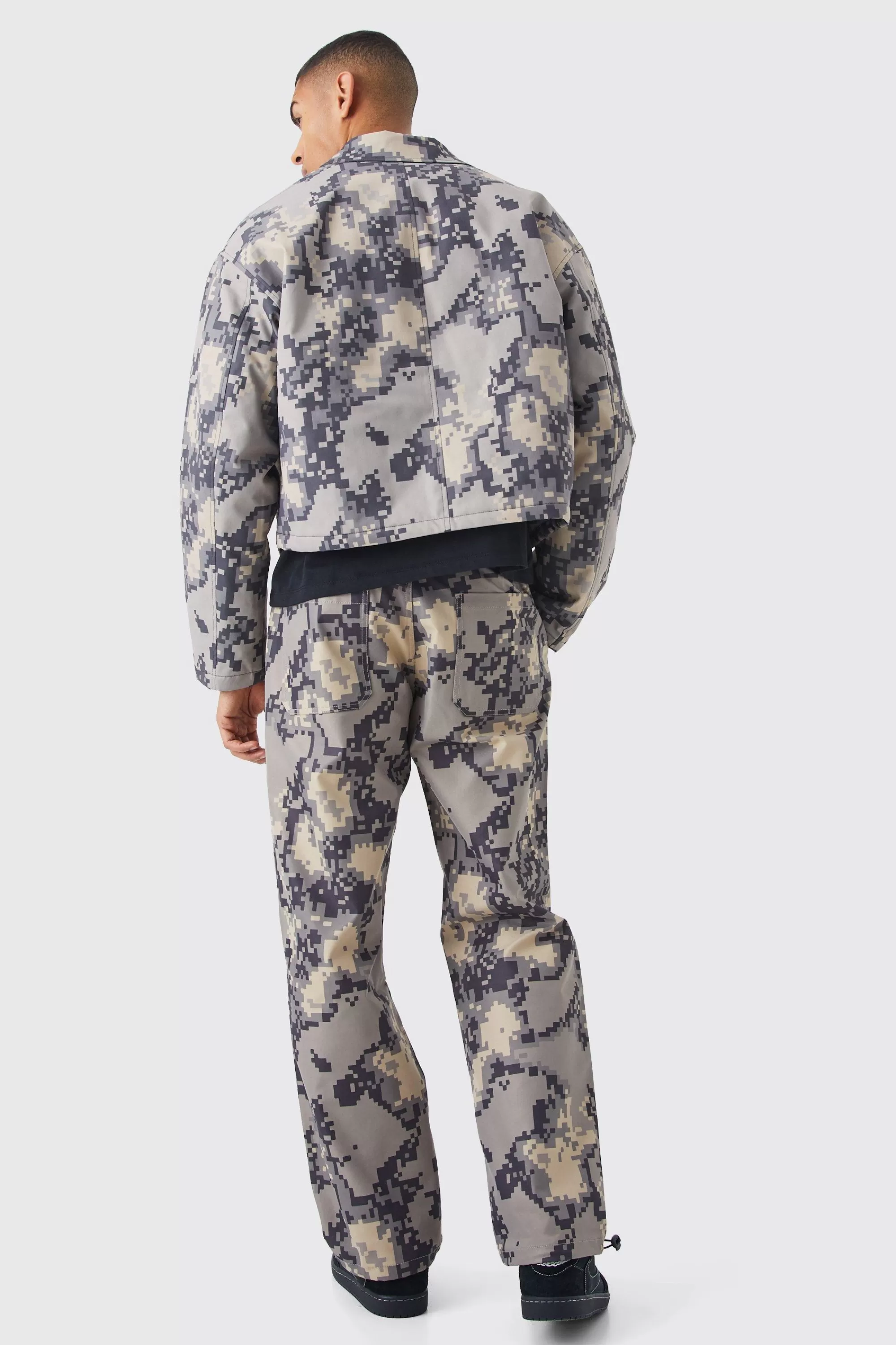 boohooMAN Relaxed Pixelated Camo Trouser | UK