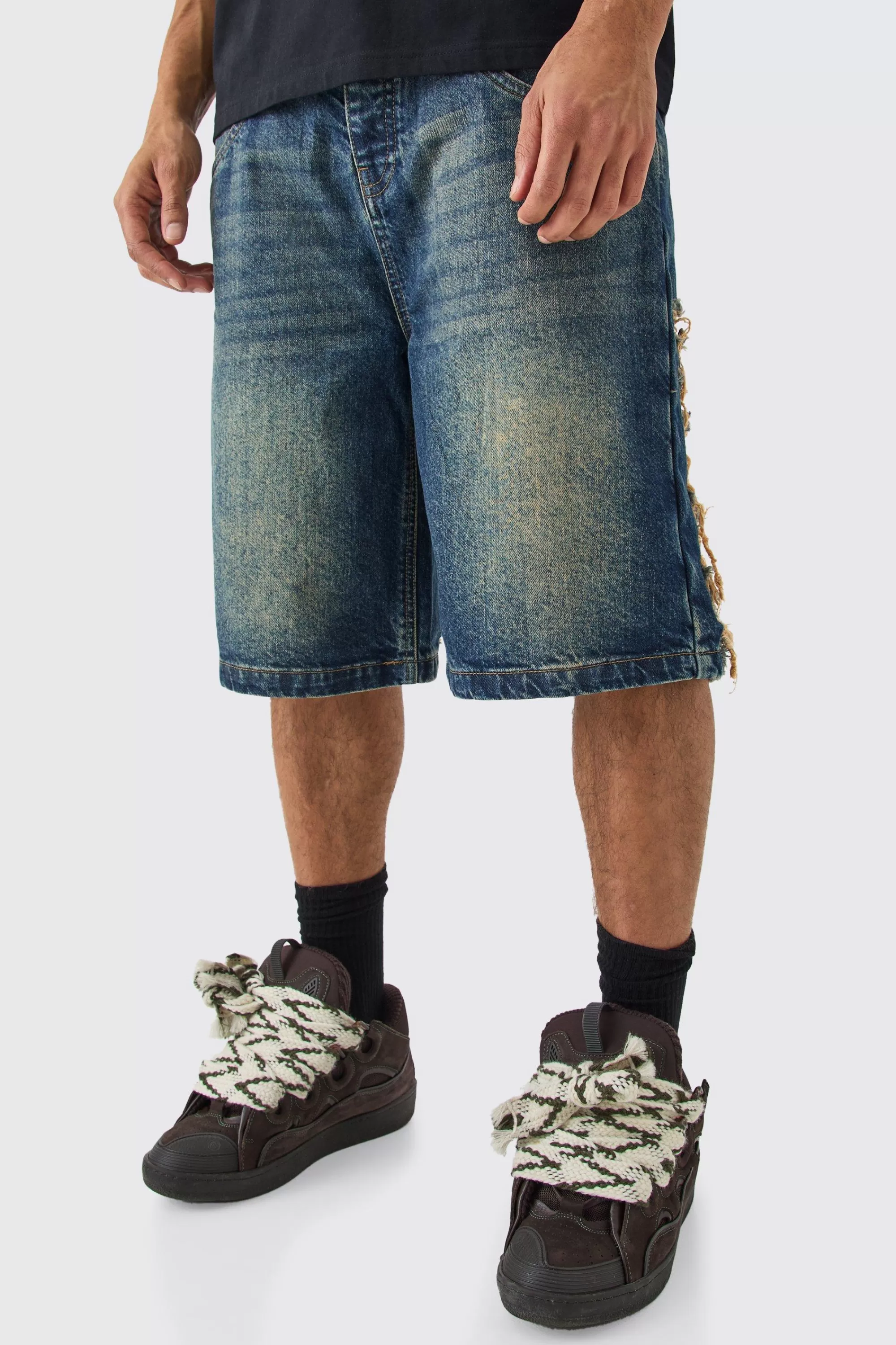 boohooMAN Relaxed Rigid Extreme Ripped Denim Jorts In | UK