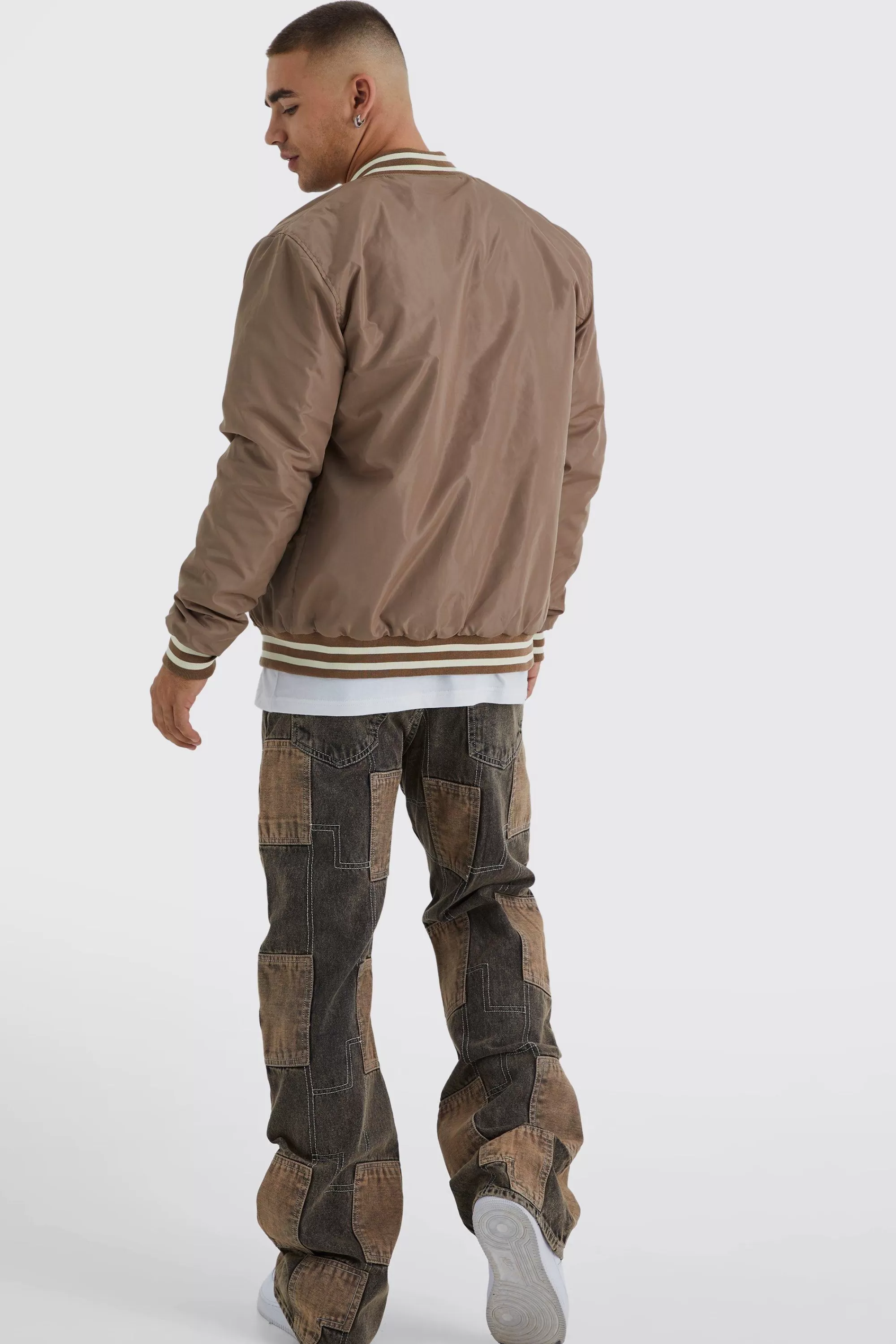 boohooMAN Relaxed Rigid Flare Patchwork Jeans | UK