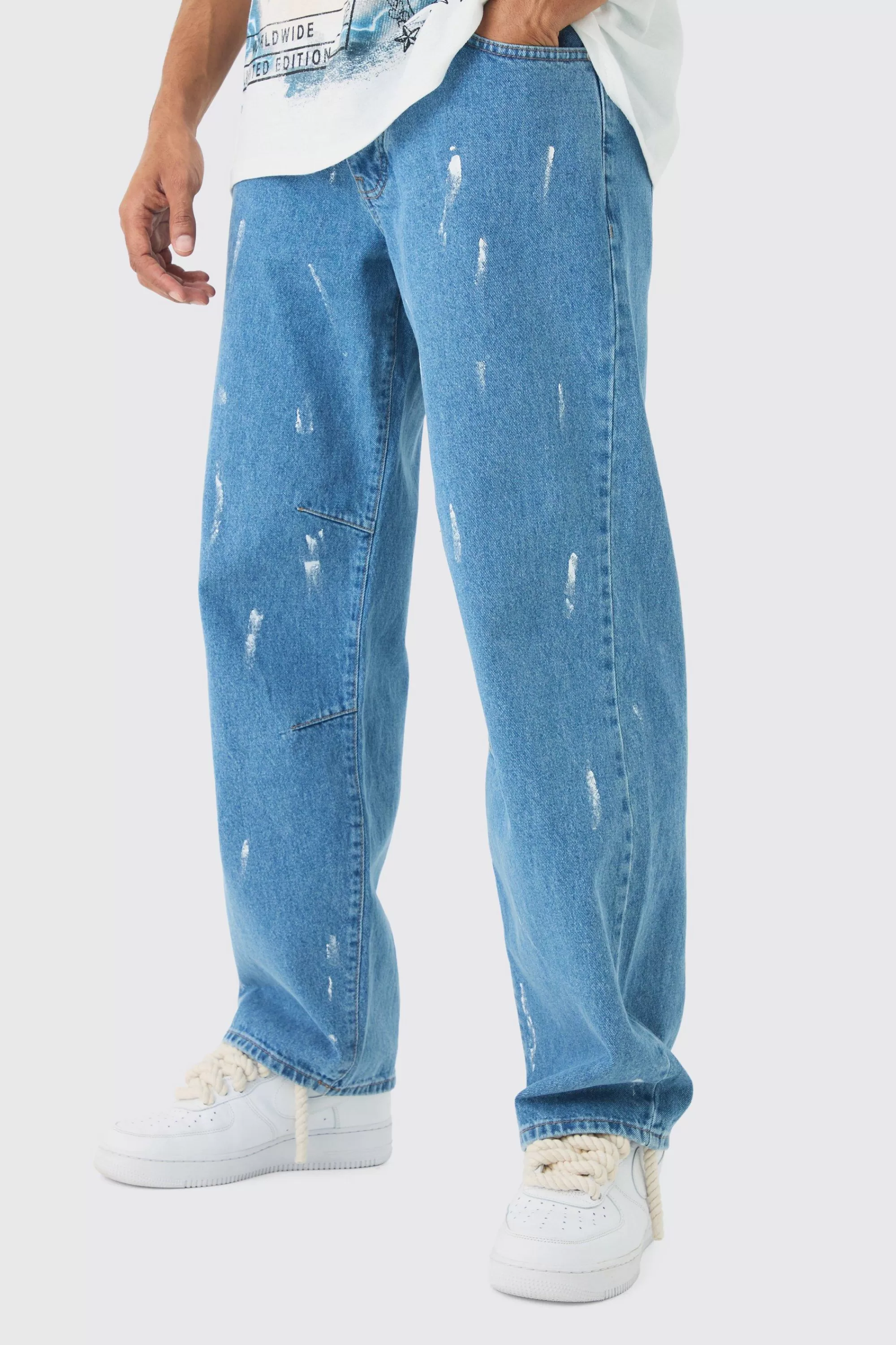 boohooMAN Relaxed Rigid Paint Splatter Denim Jeans | UK
