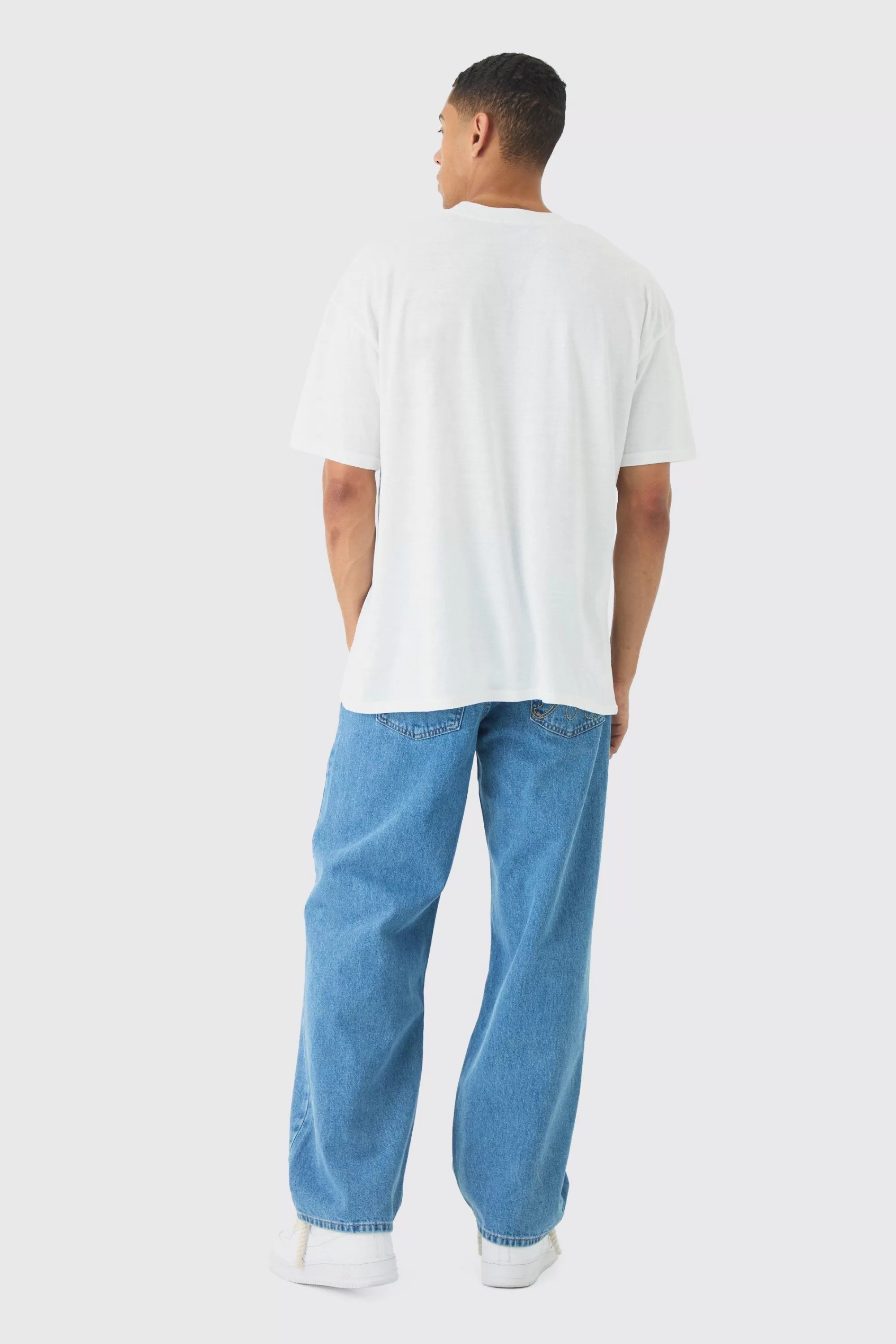 boohooMAN Relaxed Rigid Paint Splatter Denim Jeans | UK