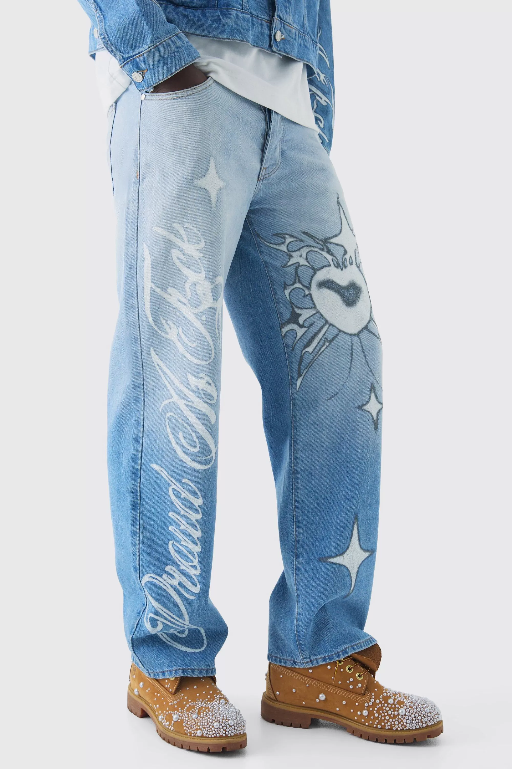 boohooMAN Relaxed Rigid Pride Printed Jeans | UK