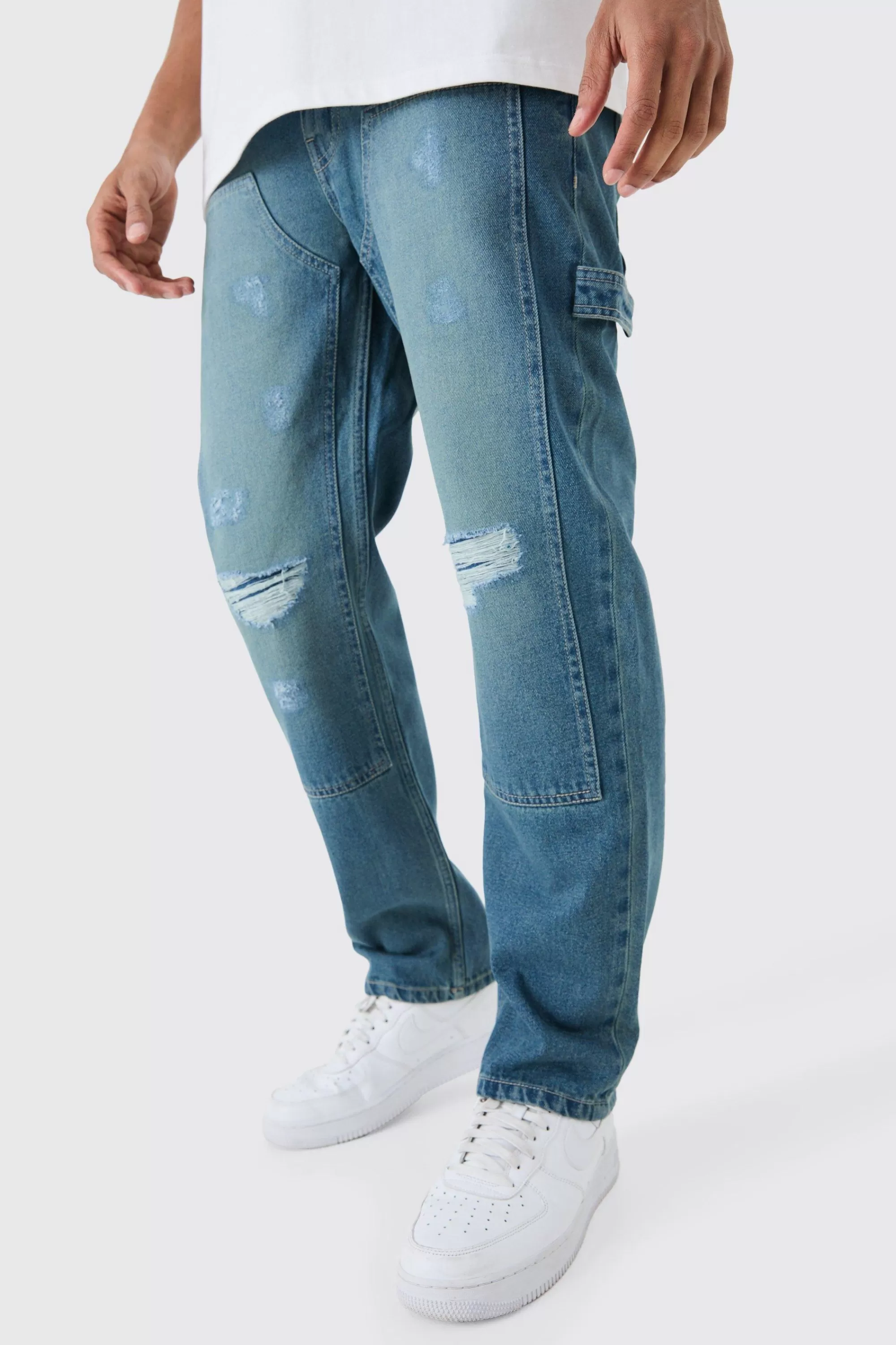 boohooMAN Relaxed Rigid Ripped Knee Carpenter Jeans In | UK