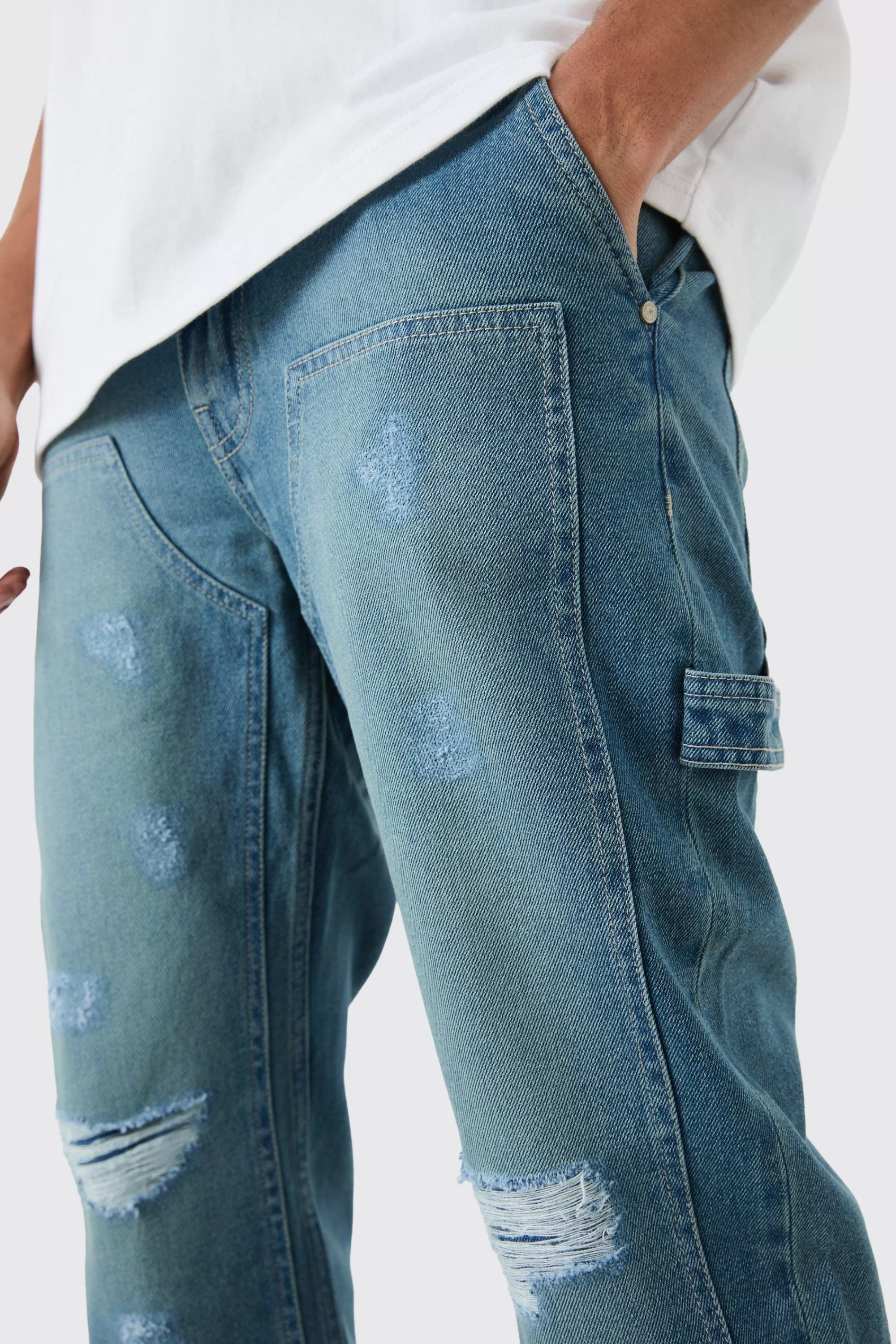 boohooMAN Relaxed Rigid Ripped Knee Carpenter Jeans In | UK