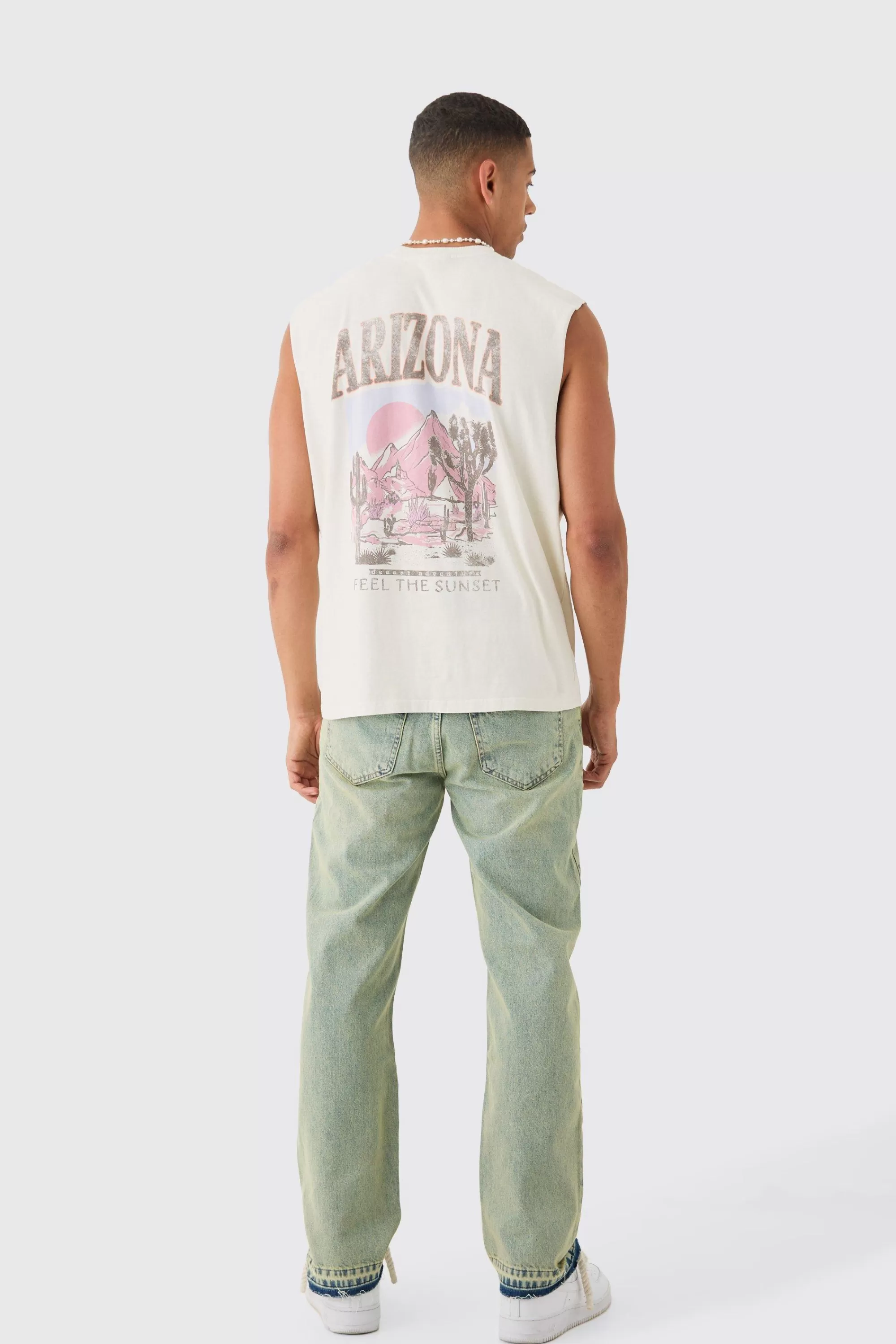 boohooMAN Relaxed Rigid Ripped Let Down Hem Jeans With Extended Drawcords In Wash | UK