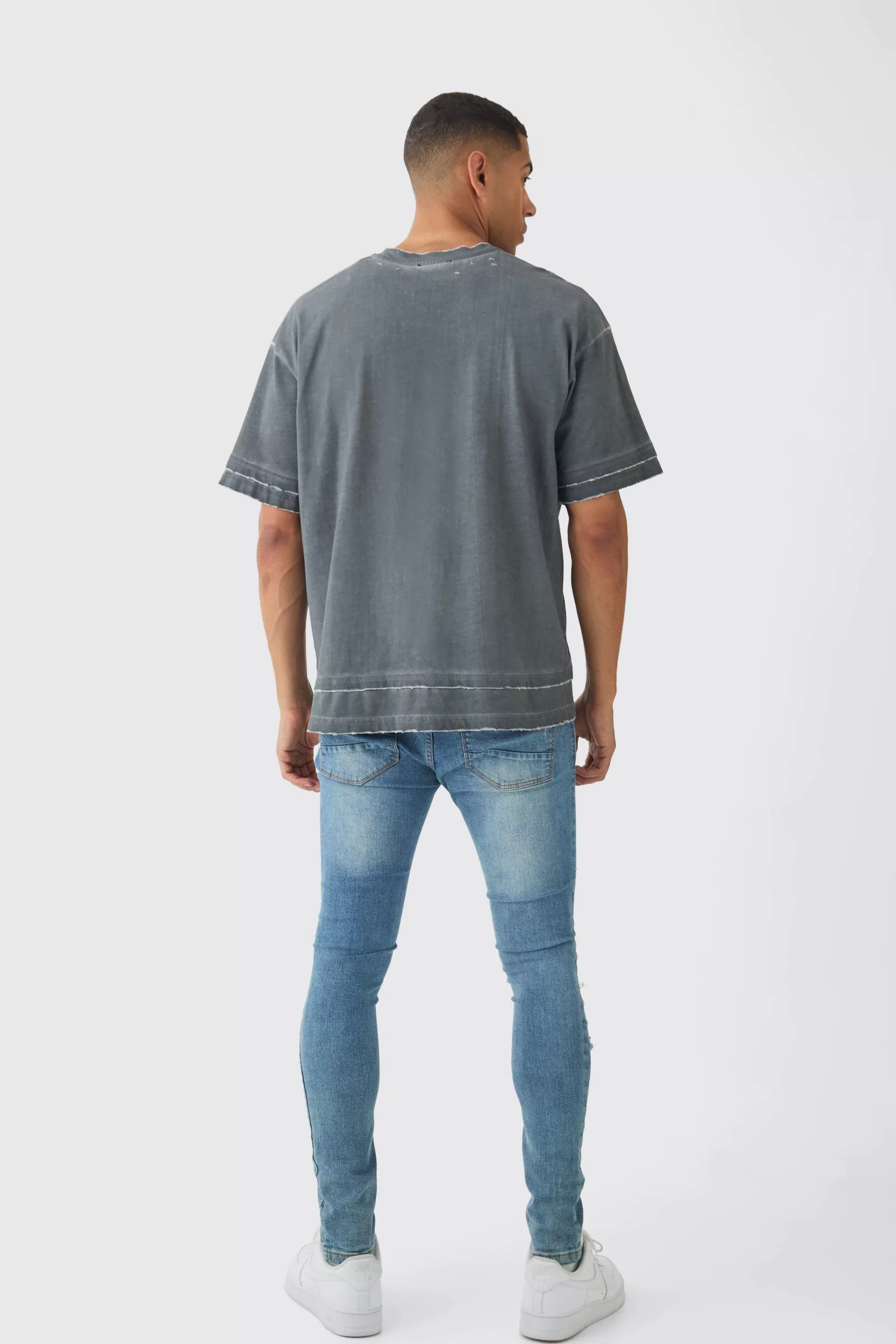 boohooMAN Skinny Fit All Over Ripped Jeans | UK