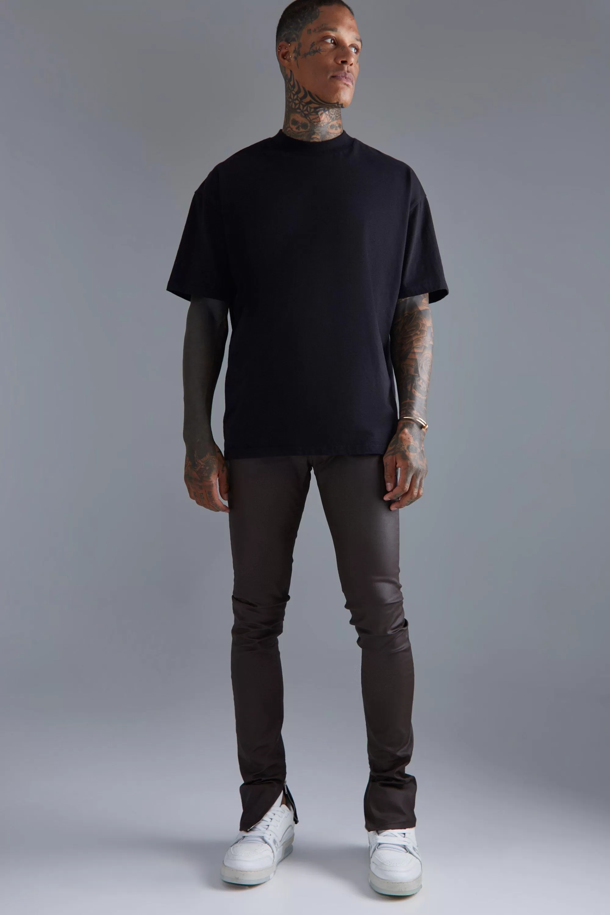 boohooMAN Skinny Stacked Zip Hem Coated Jeans | UK