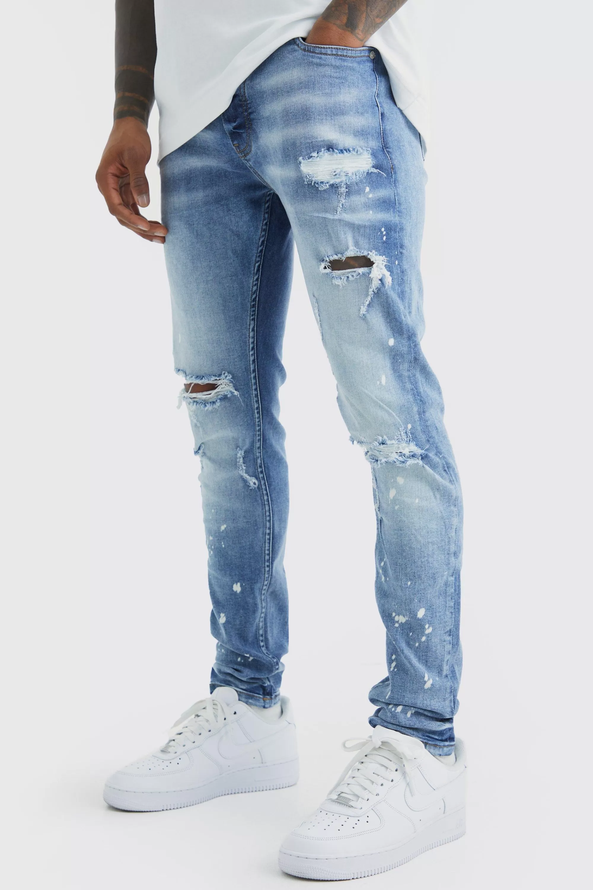 boohooMAN Skinny Stretch Bleached Ripped Knee Jeans | UK