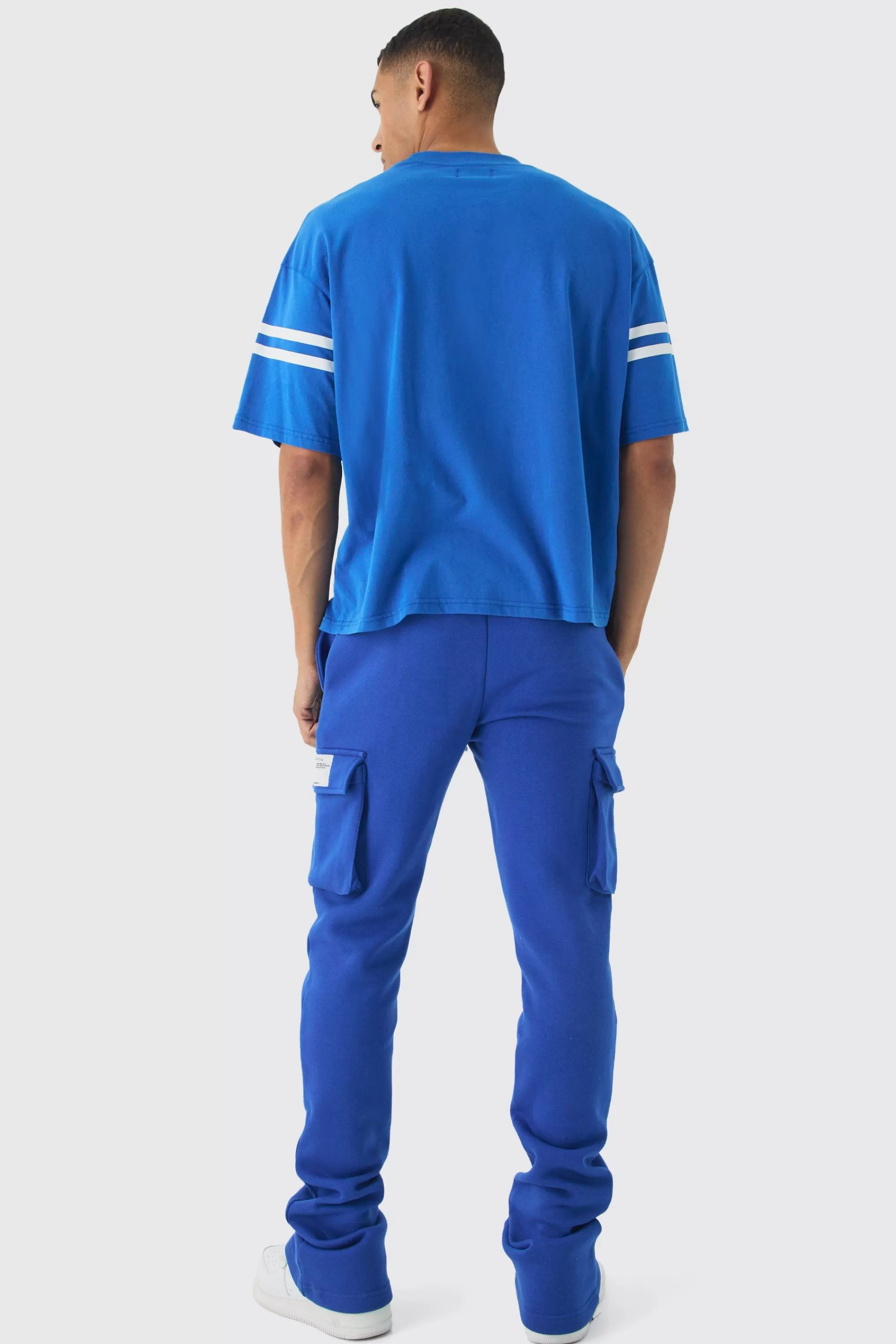 boohooMAN Slim Fit Extreme Stacked Woven Tab Cargo Jogger | UK
