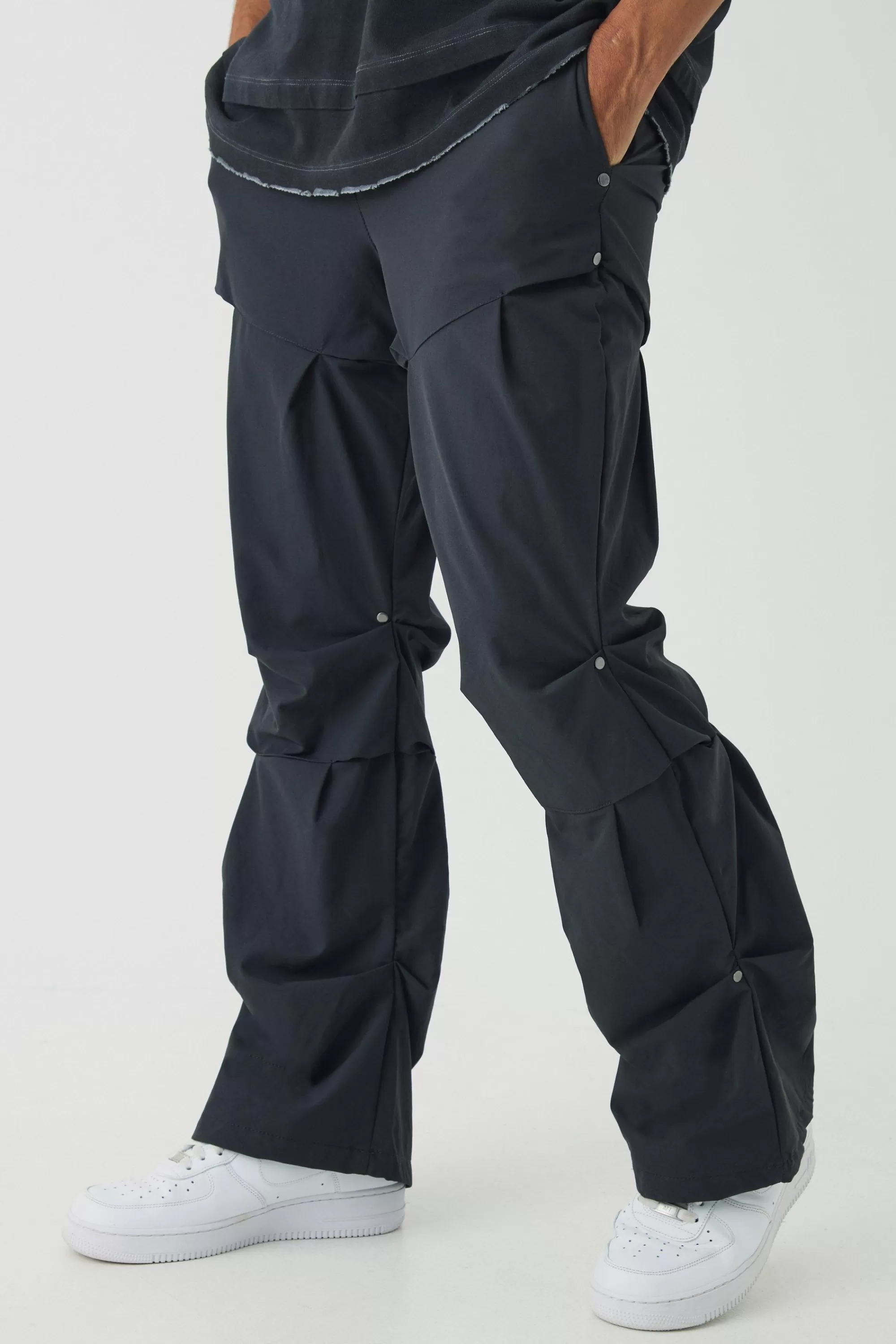 boohooMAN Slim Fit Flare Stacked Trousers With Ruched Detail | UK
