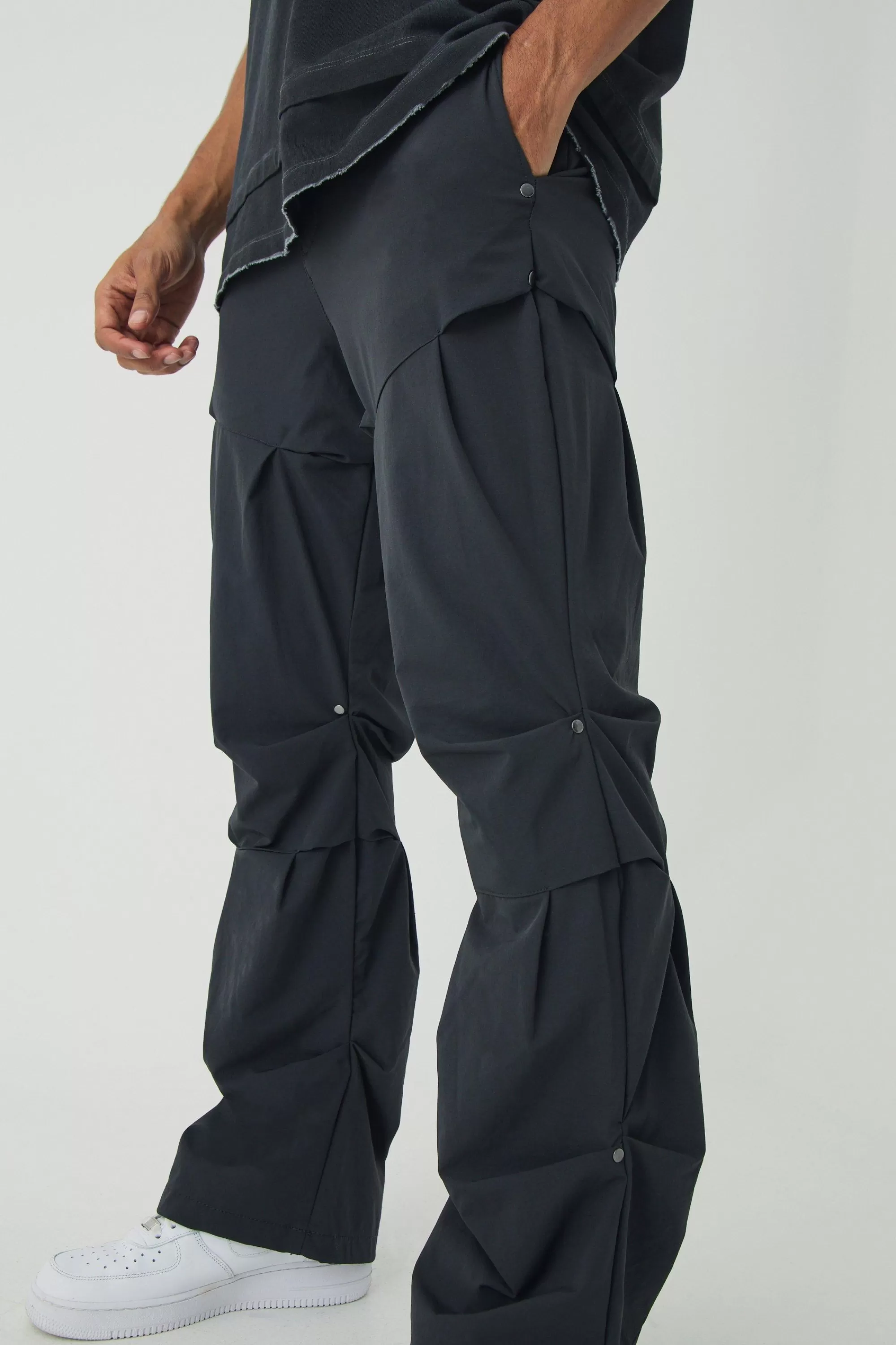 boohooMAN Slim Fit Flare Stacked Trousers With Ruched Detail | UK
