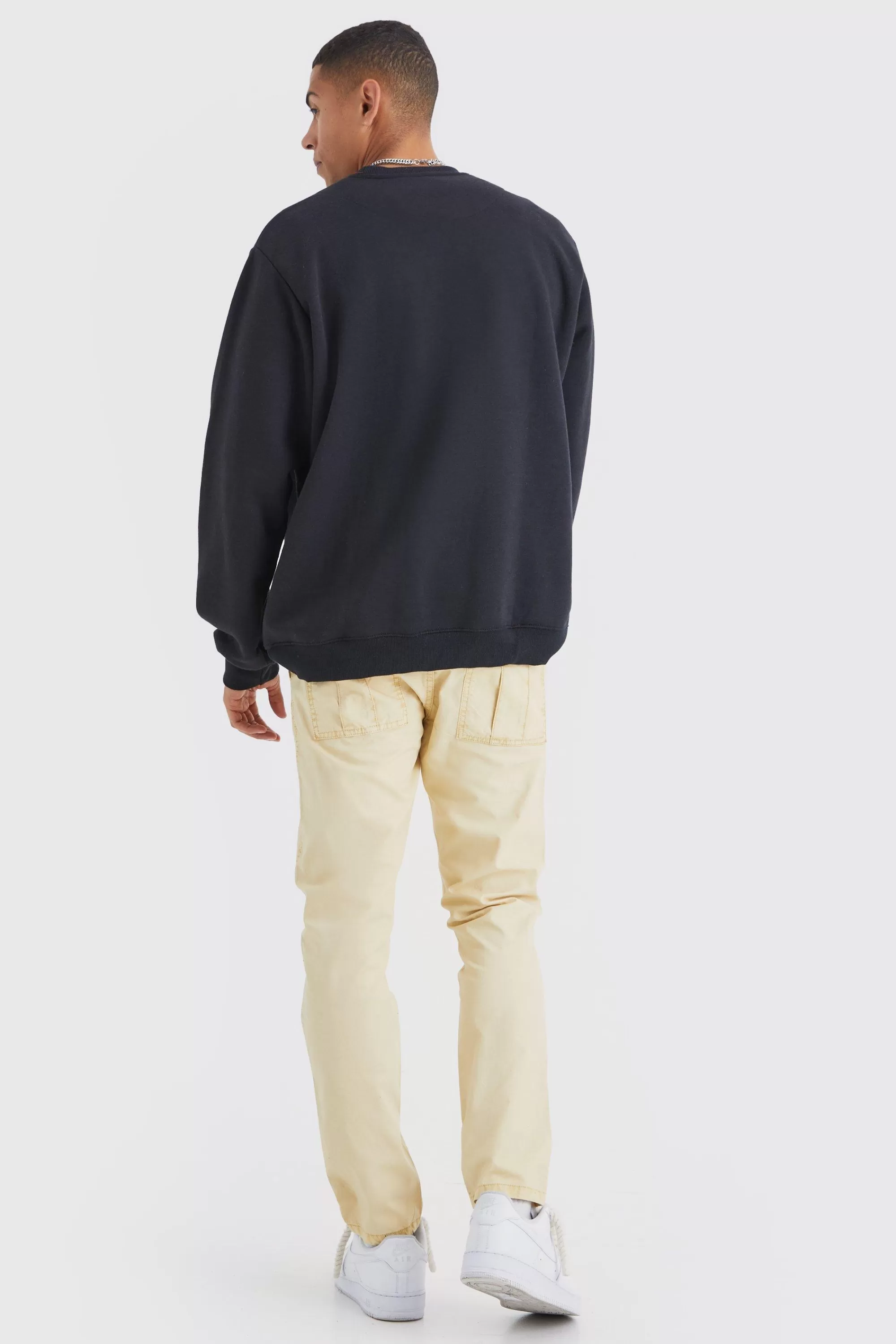 boohooMAN Slim Fit Overdye Acid Wash Trouser | UK