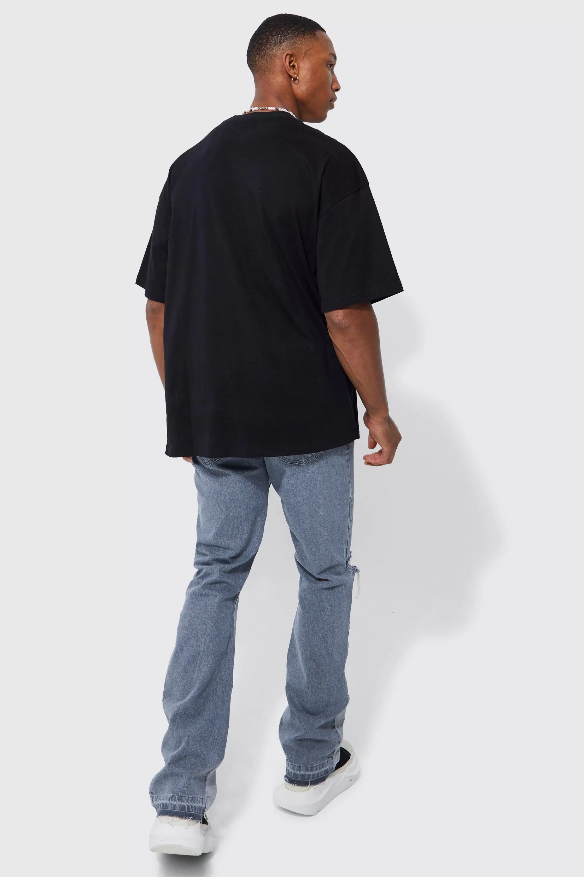boohooMAN Slim Flare Distressed Panel Jeans | UK