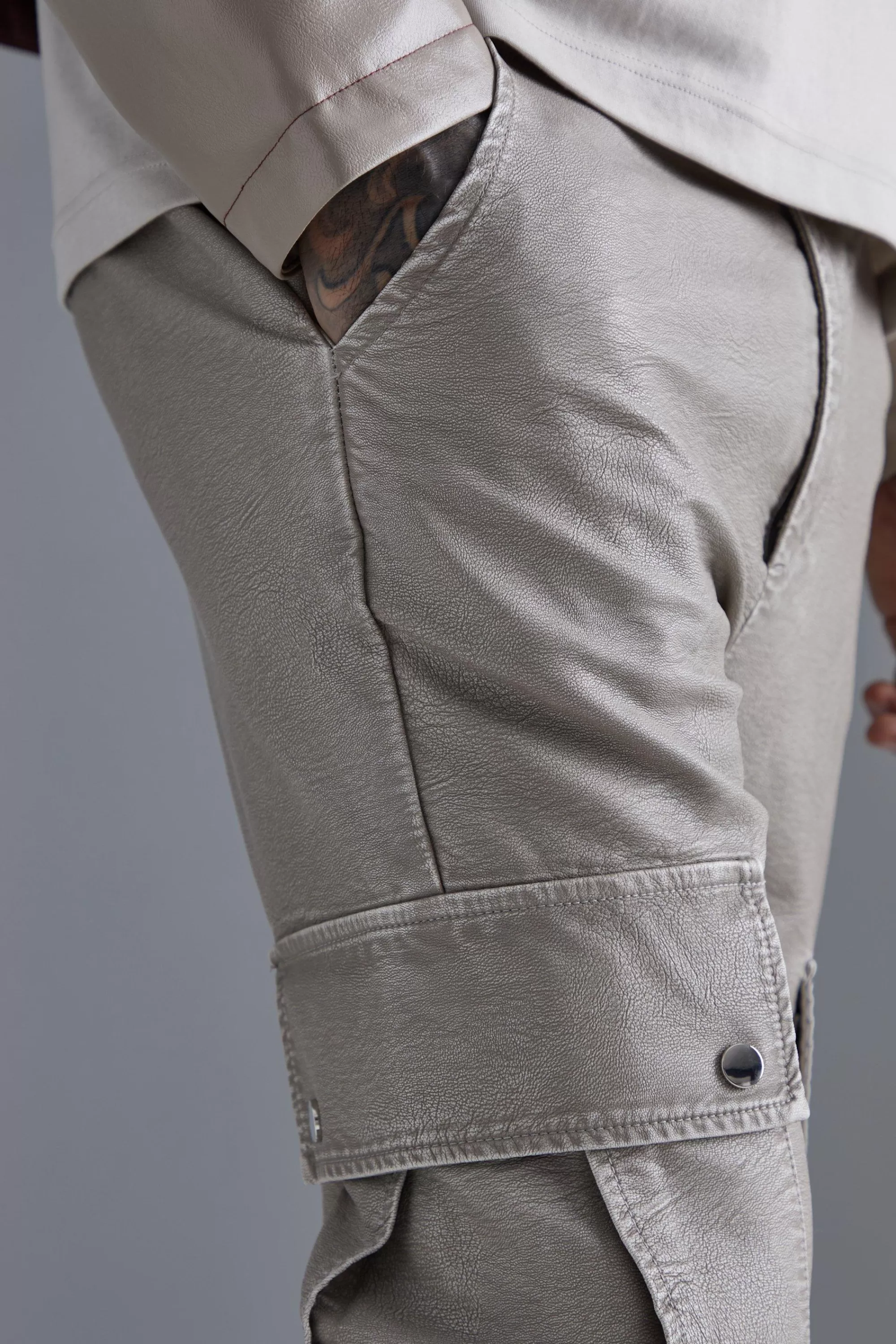 boohooMAN Slim Flare Washed Pu Cargo Popper Hem Trouser | UK