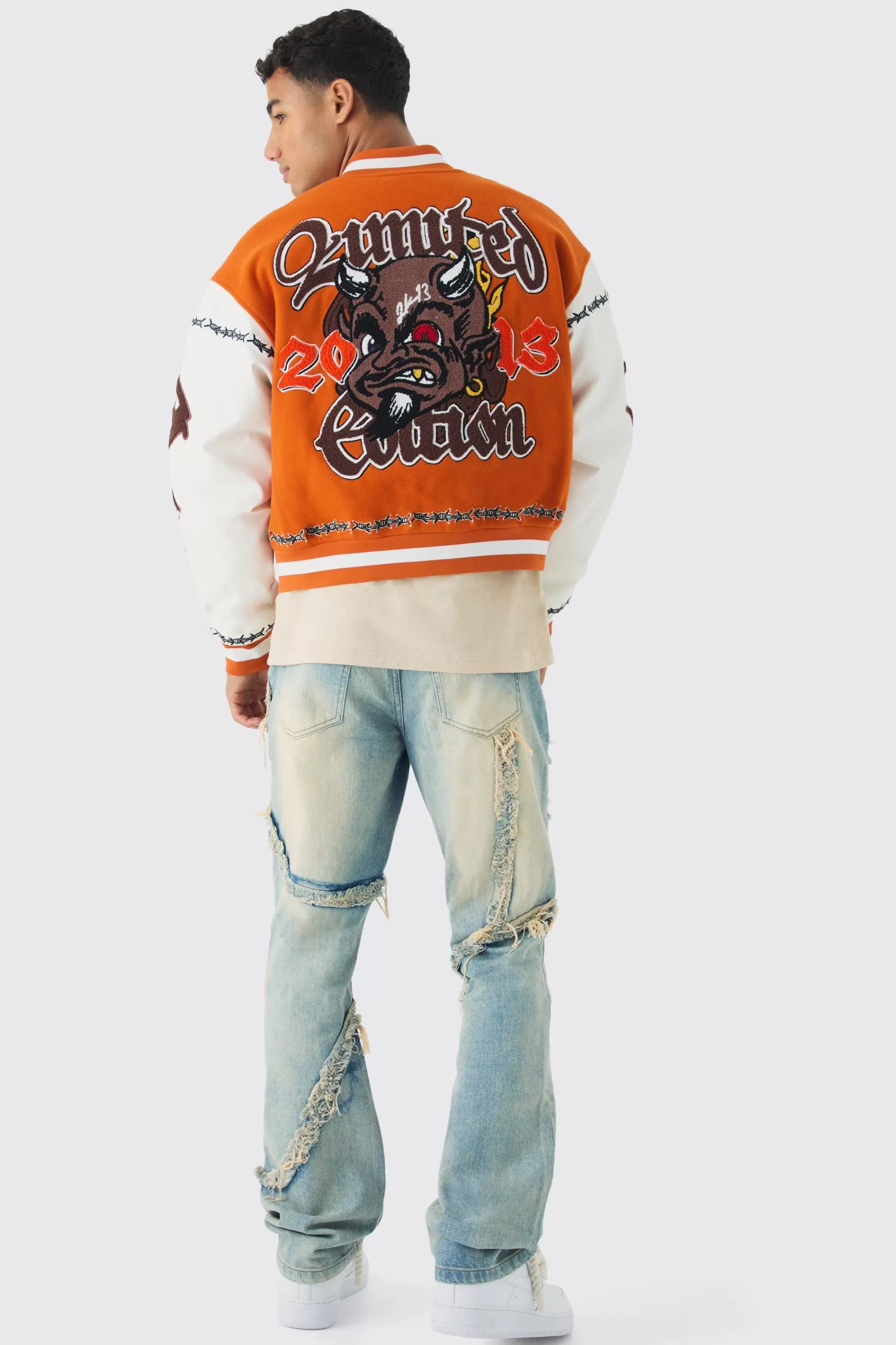 boohooMAN Slim Flared Patchwork Distressed Bleached Jeans | UK