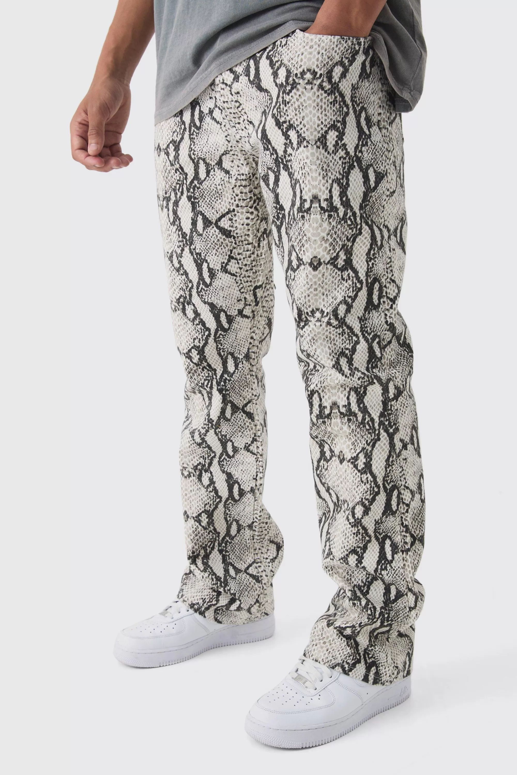 boohooMAN Slim Flared Snake Print Jeans | UK