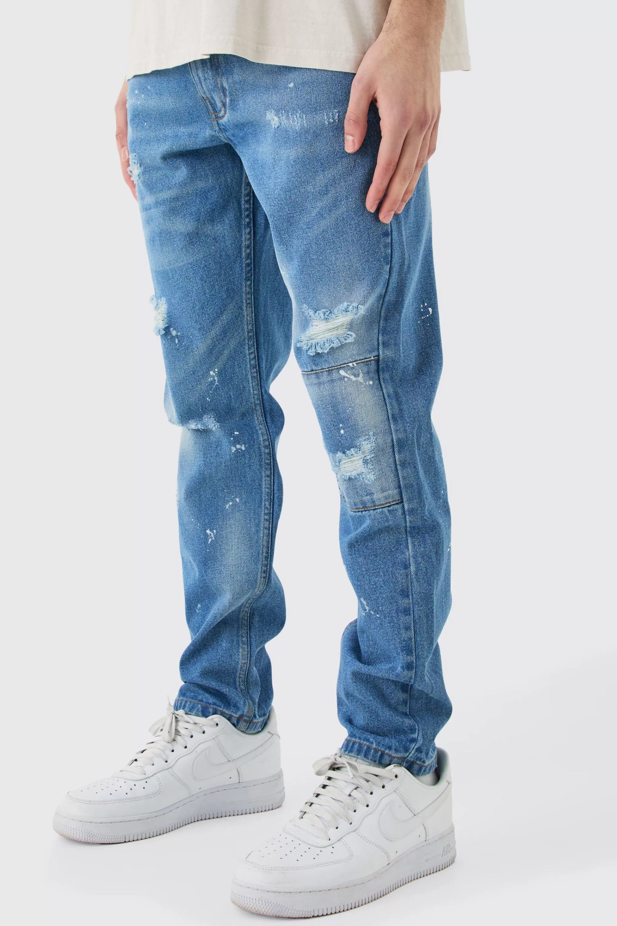 boohooMAN Slim Rigid All Over Paint Detail Knee Ripped Jeans | UK