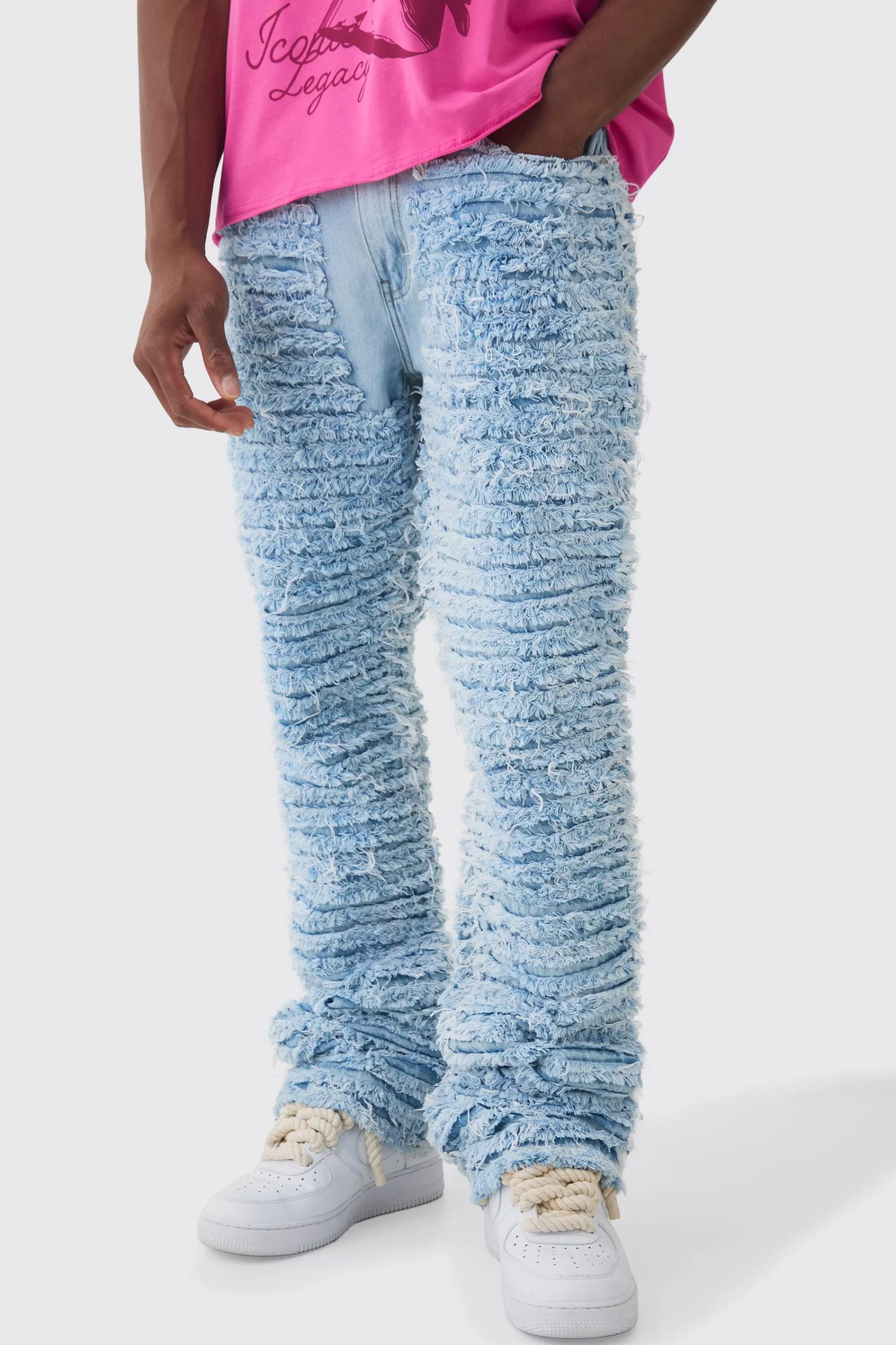 boohooMAN Slim Rigid Flare All Over Distressed Jeans In | UK