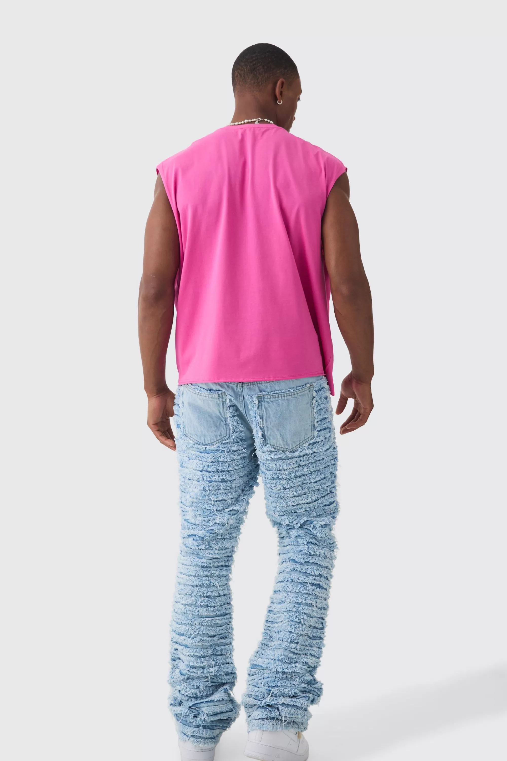 boohooMAN Slim Rigid Flare All Over Distressed Jeans In | UK
