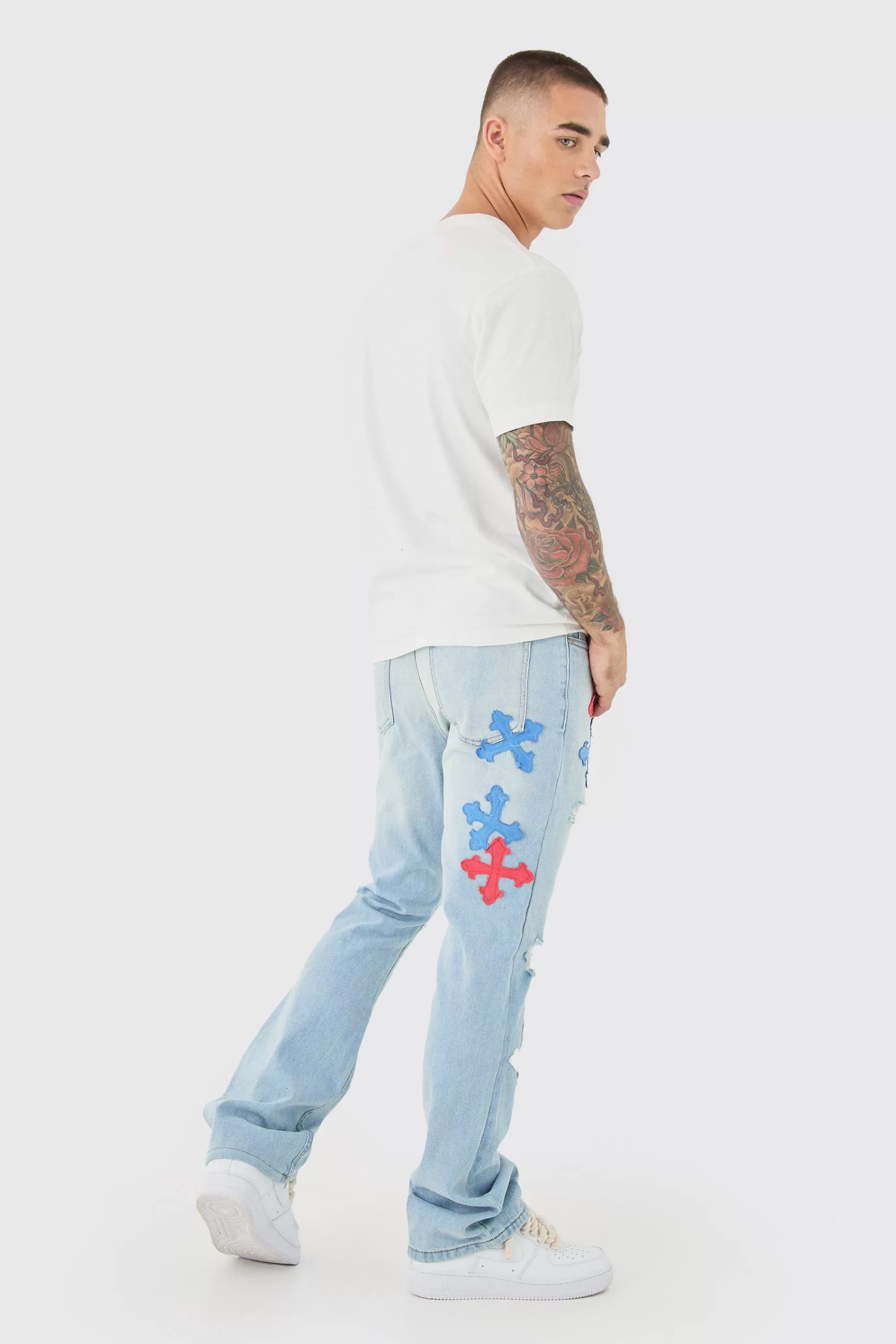 boohooMAN Slim Rigid Flare Applique Jeans In | UK