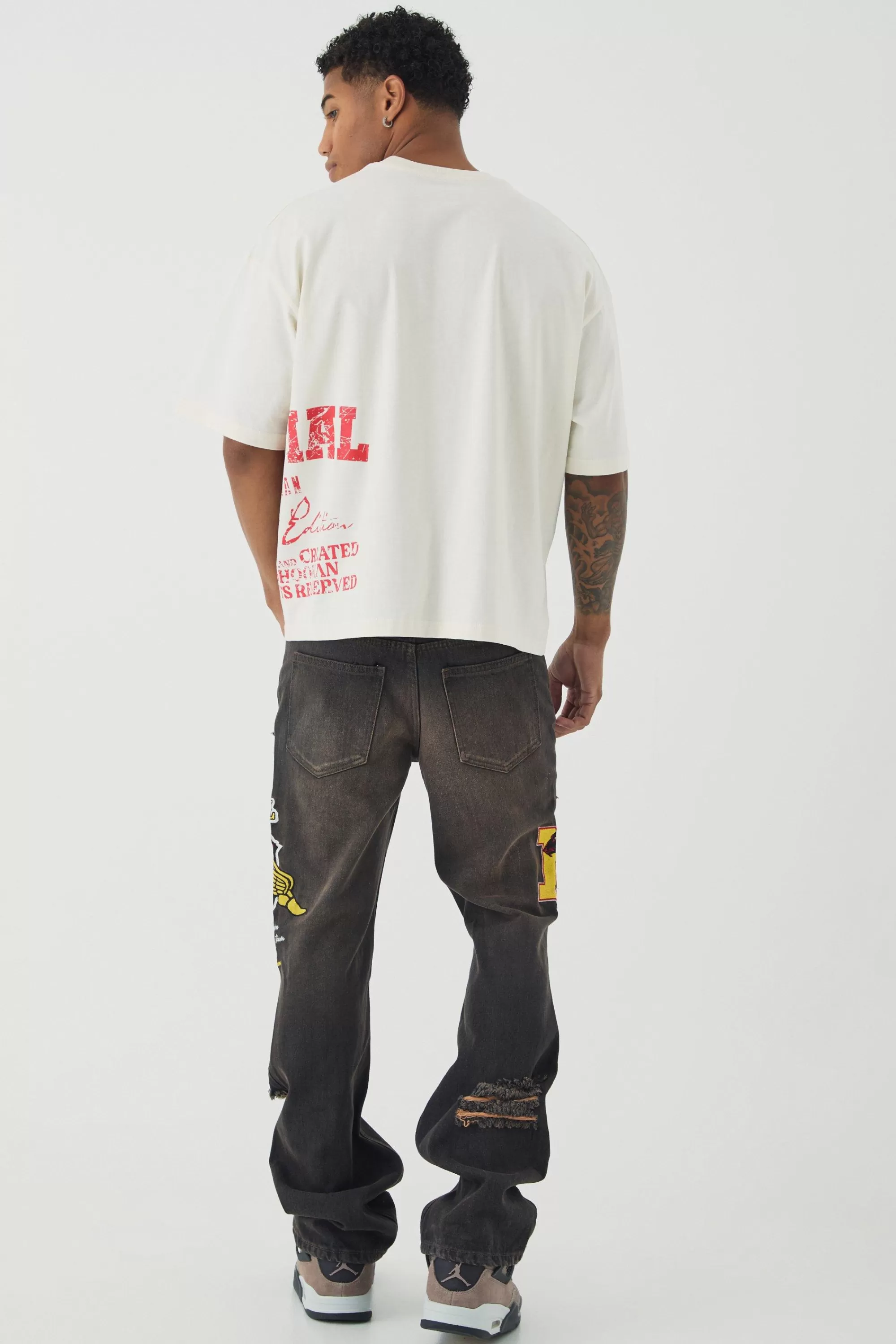 boohooMAN Slim Rigid Flare Varsity Applique Wash Jeans | UK