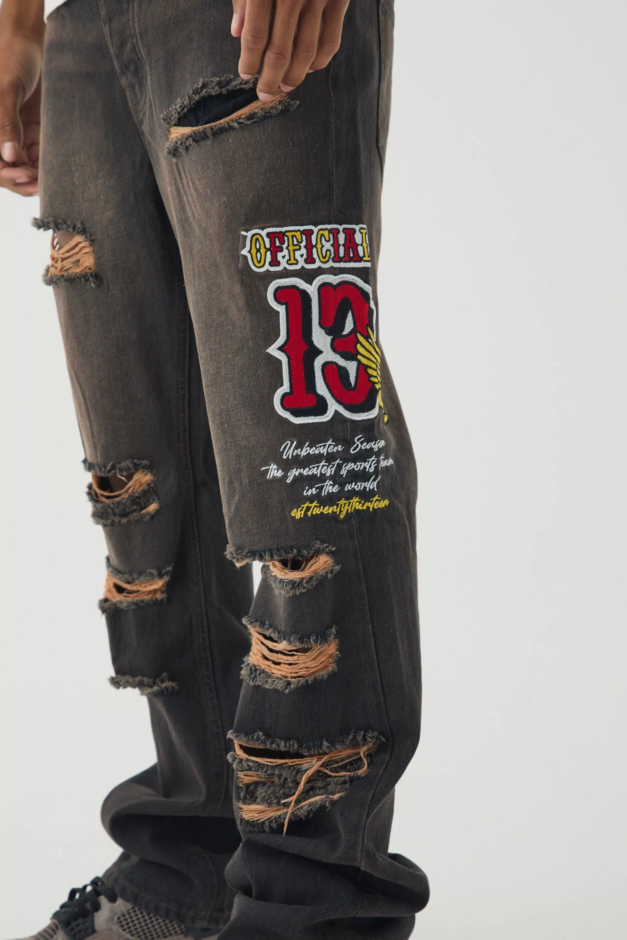 boohooMAN Slim Rigid Flare Varsity Applique Wash Jeans | UK