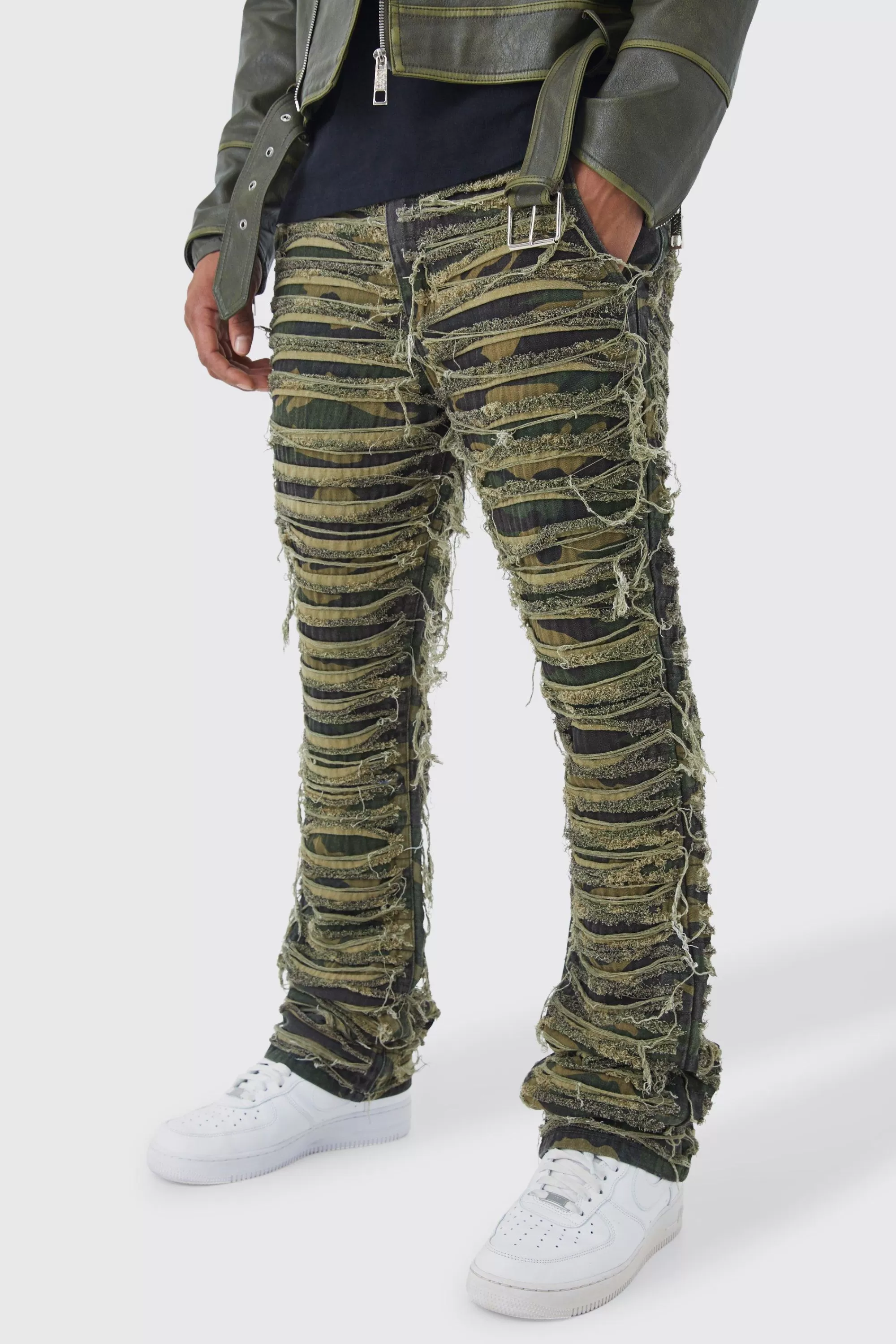 boohooMAN Slim Stacked Flare Heavily Distressed Camo Trouser | UK