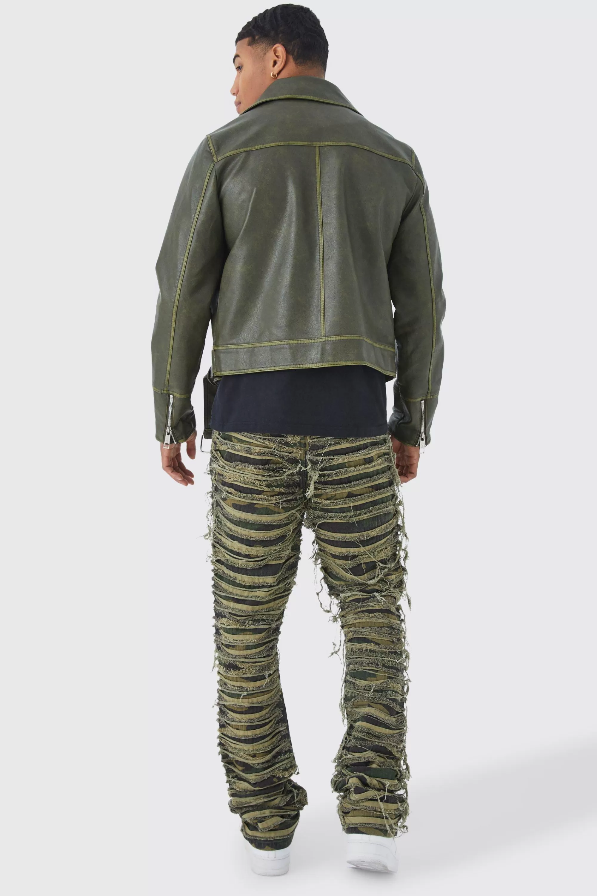 boohooMAN Slim Stacked Flare Heavily Distressed Camo Trouser | UK