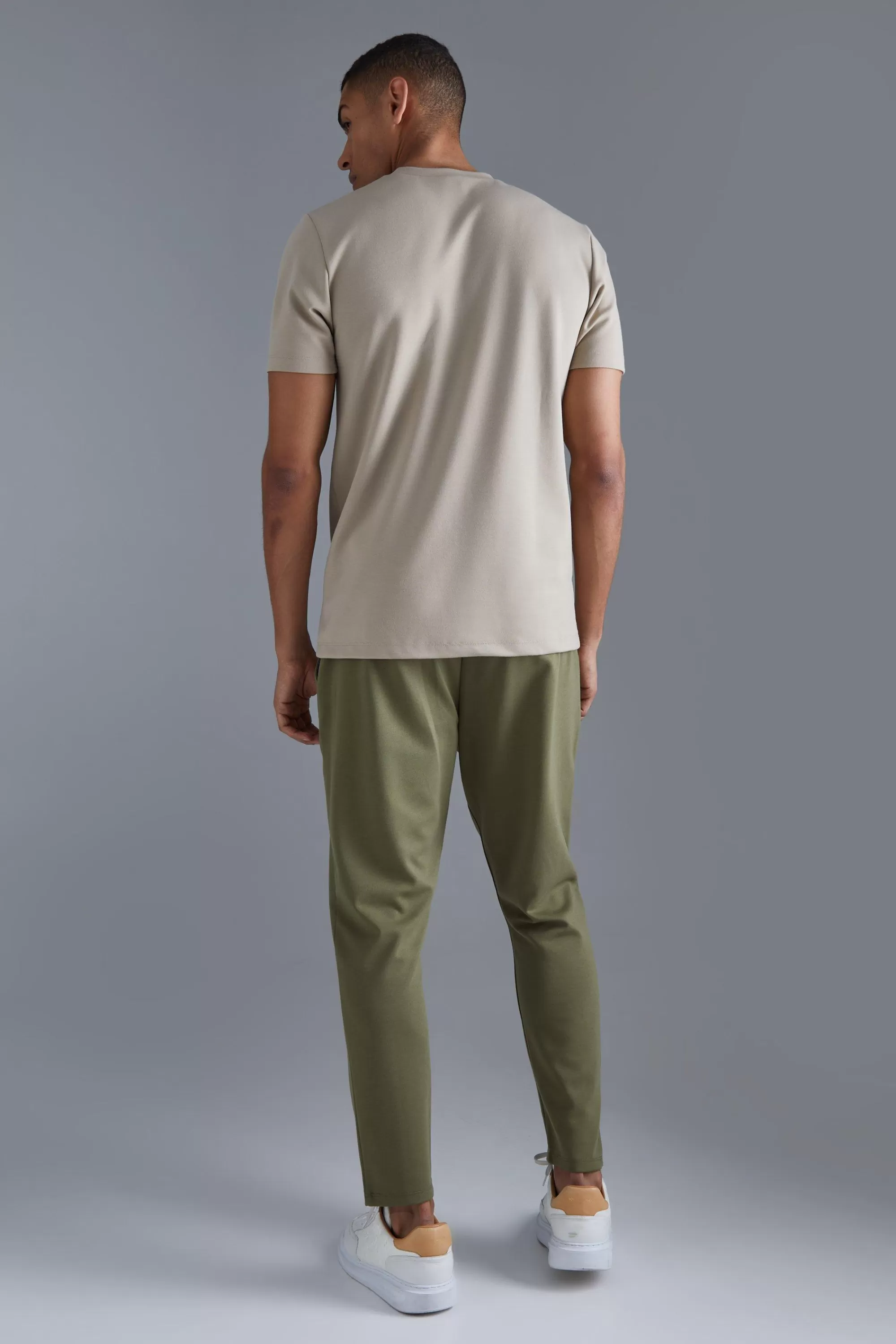 boohooMAN Slim Tapered Elastic Waist Pintuck Crop Jogger | UK