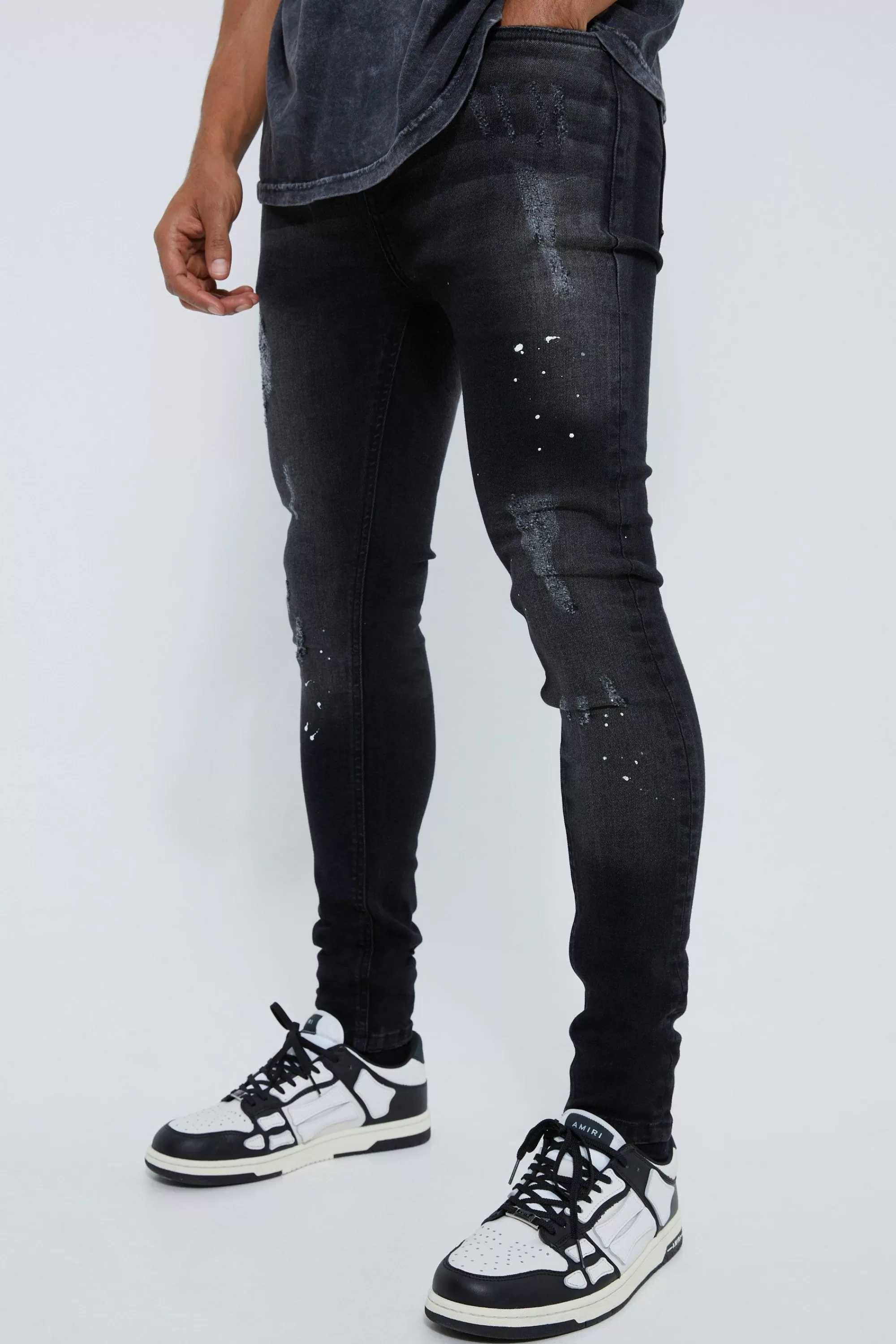 boohooMAN Super Skinny Distressed Paint Splat Jeans | UK