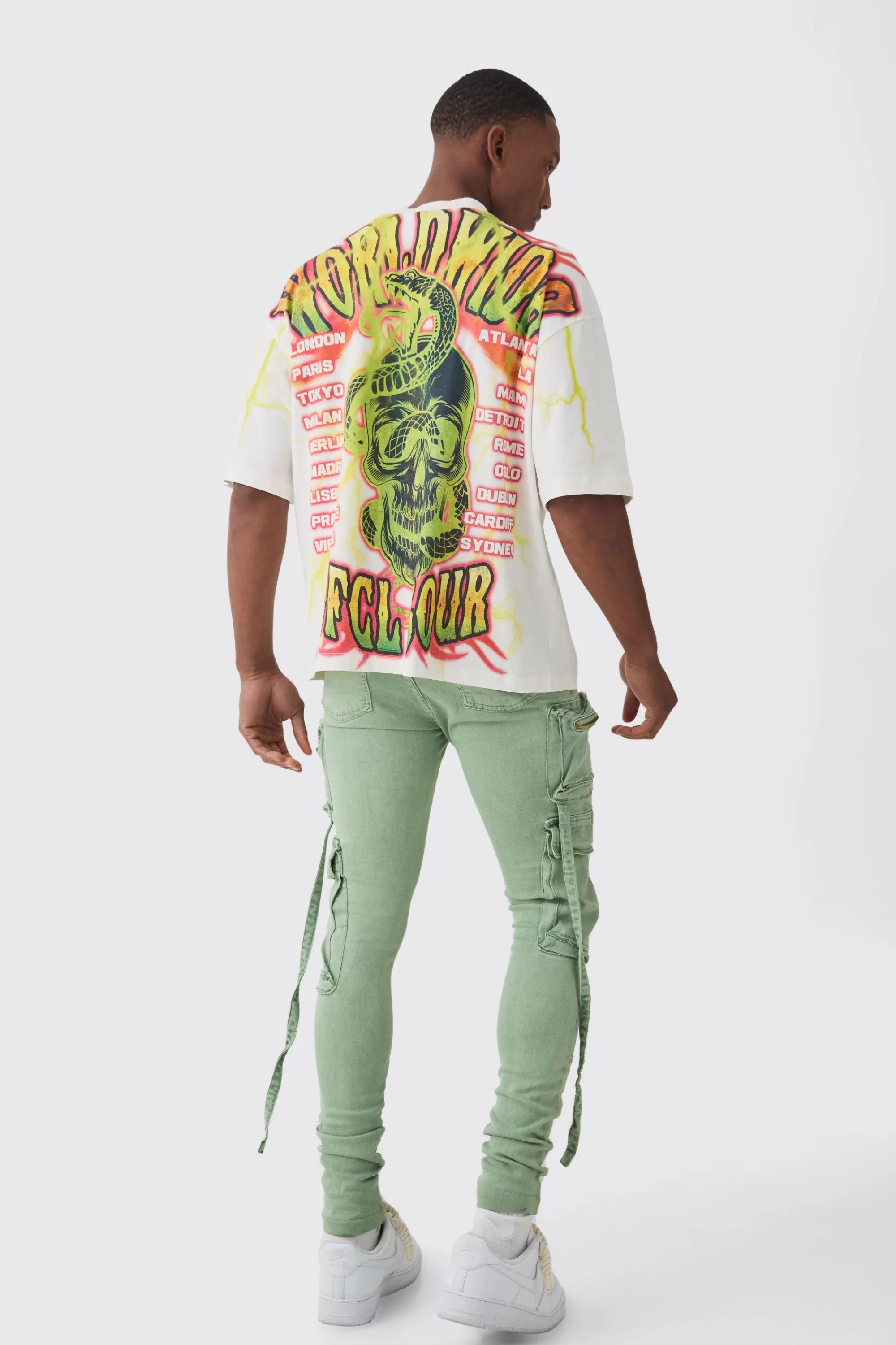 boohooMAN Super Skinny Stretch Strap Detail Paint Splatter Cargo Jeans | UK