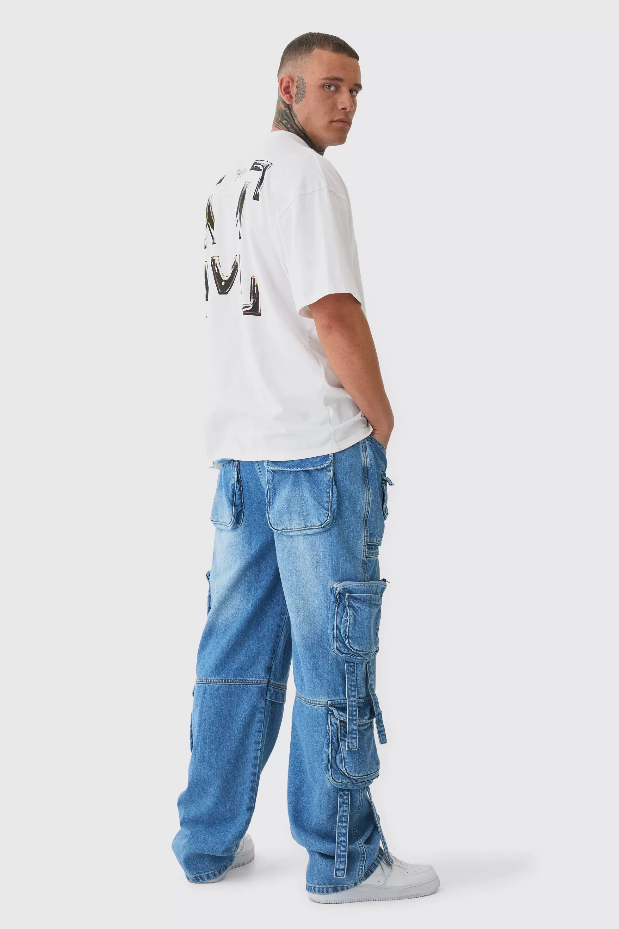 boohooMAN Tall Baggy Rigid Multi Pocket Strap Detail Cargo Jeans | UK
