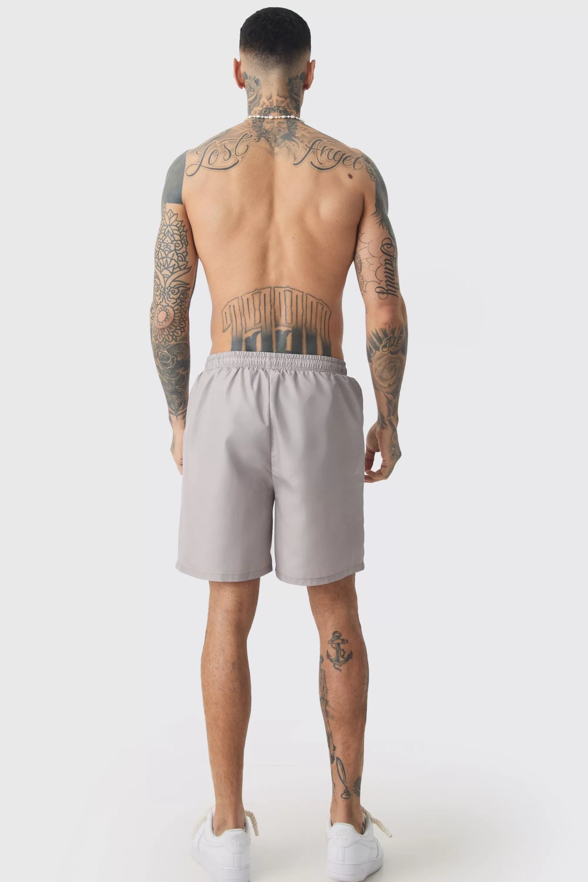 boohooMAN Tall Bandanna Printed Swim Shorts | UK
