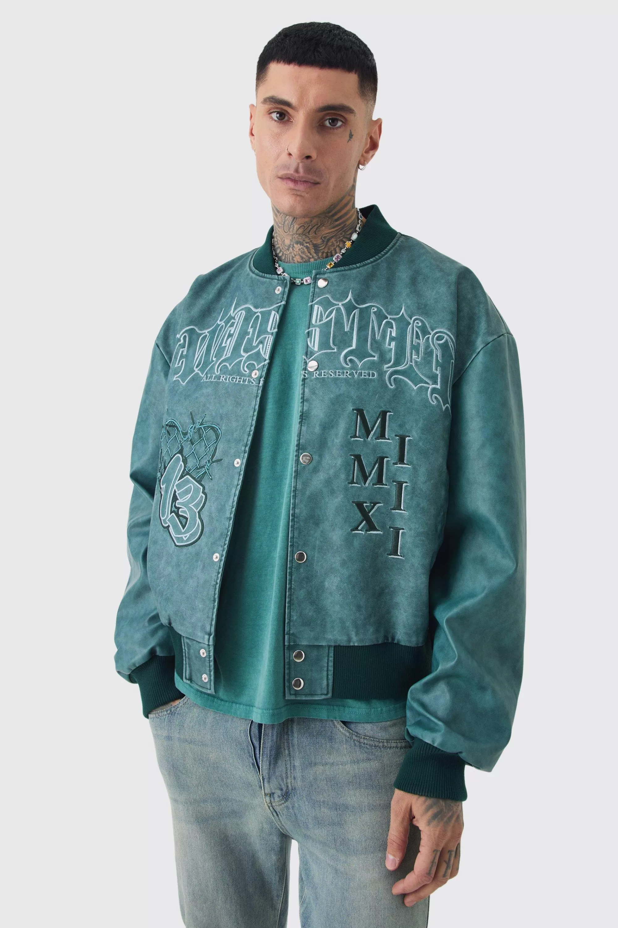 boohooMAN Tall Boxy Tonal Badge Tumbled PU Varsity Jacket In | UK